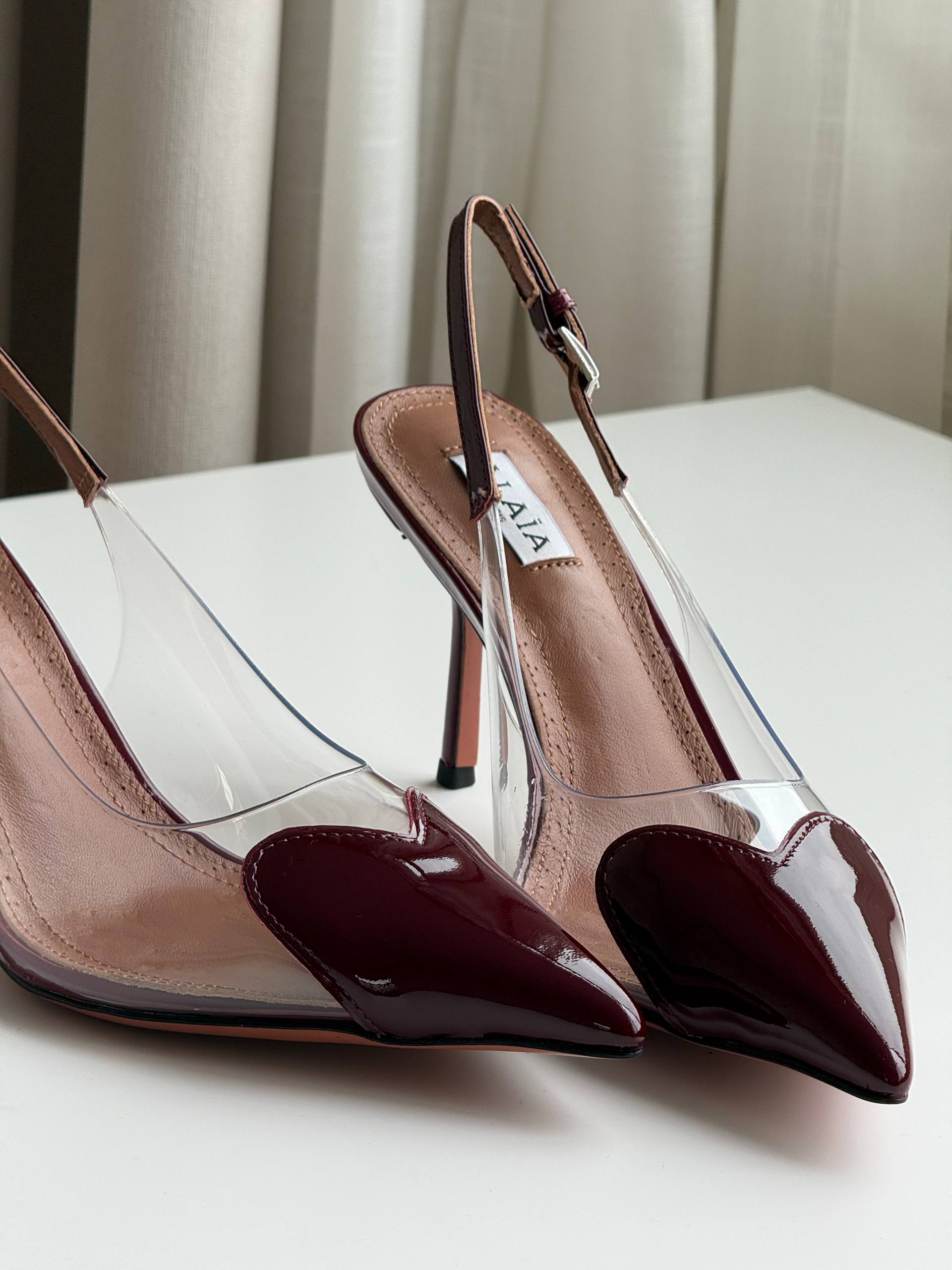 ALAÏA Le Cœur 90 Patent Leather & PVC Slingback Pumps (Burgundy)