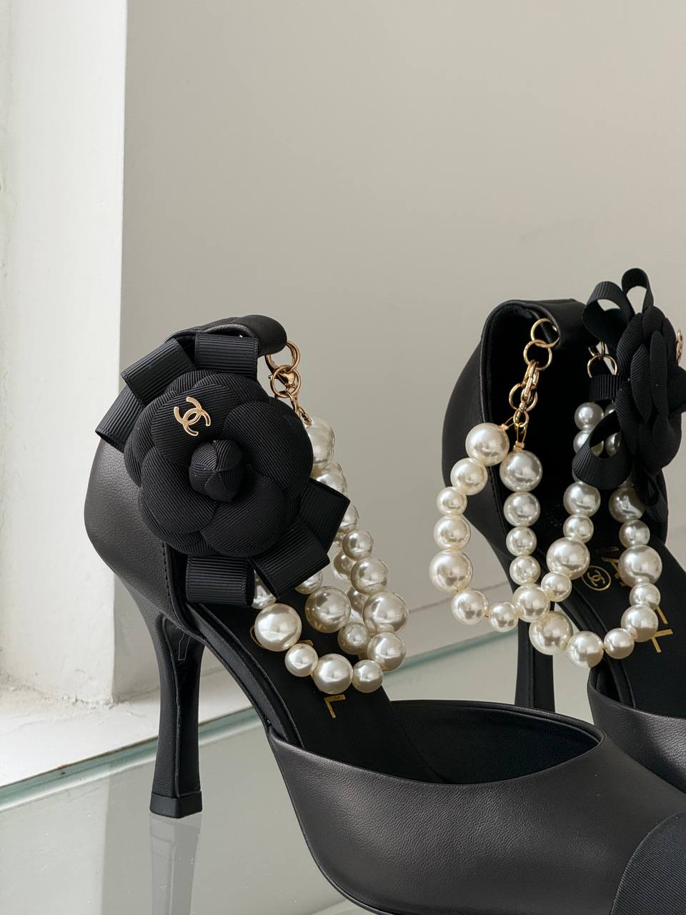 CHANEL Camellia Pearl Chain Pointed-Toe Heels