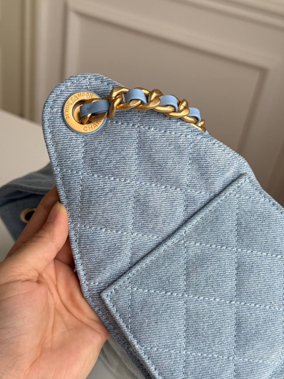 Chanel 25 Quilted Denim Drawstring Bucket Bag