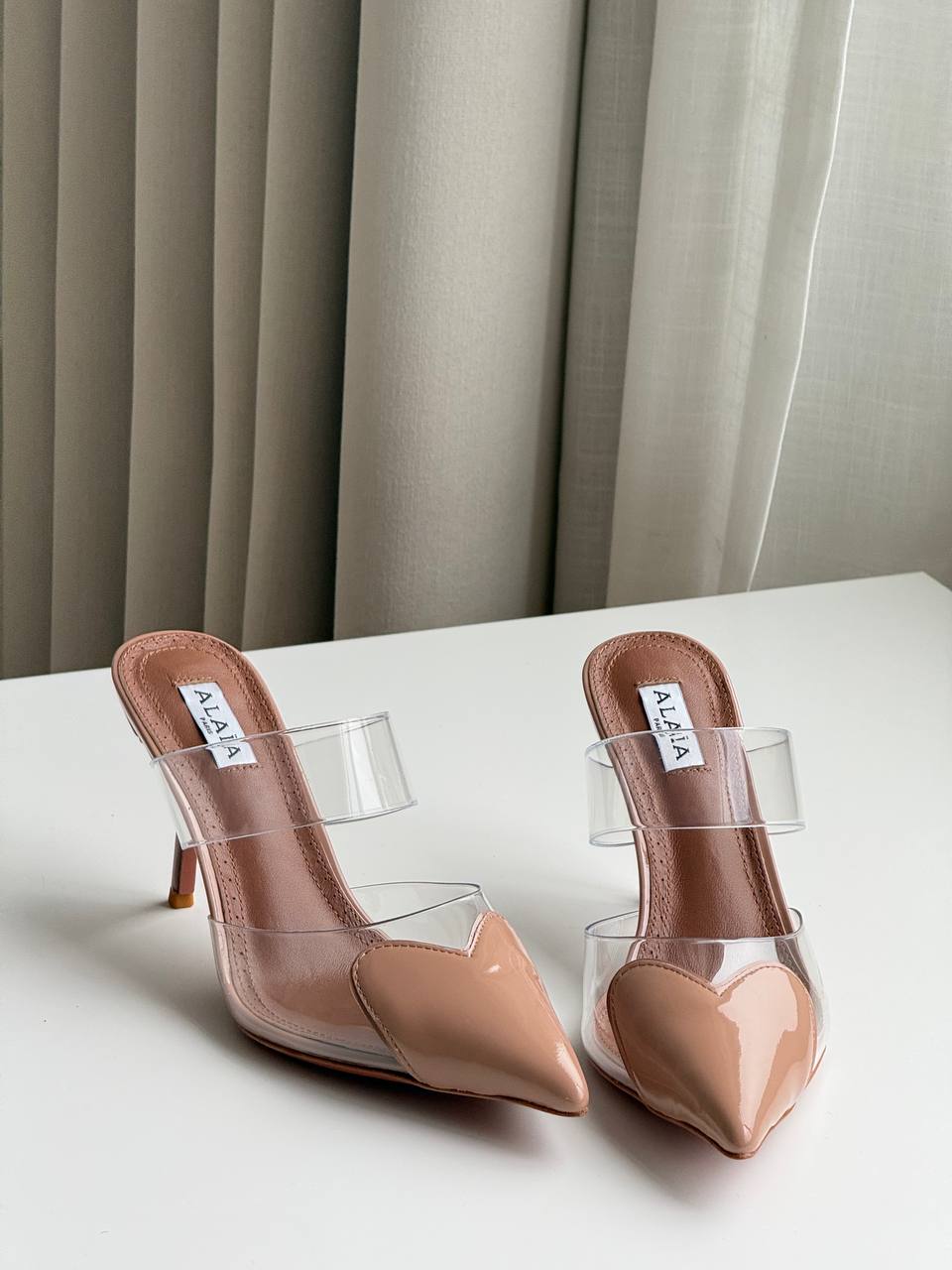 ALAÏA Heart PVC & Patent Leather Pointed-Toe Mules Nude