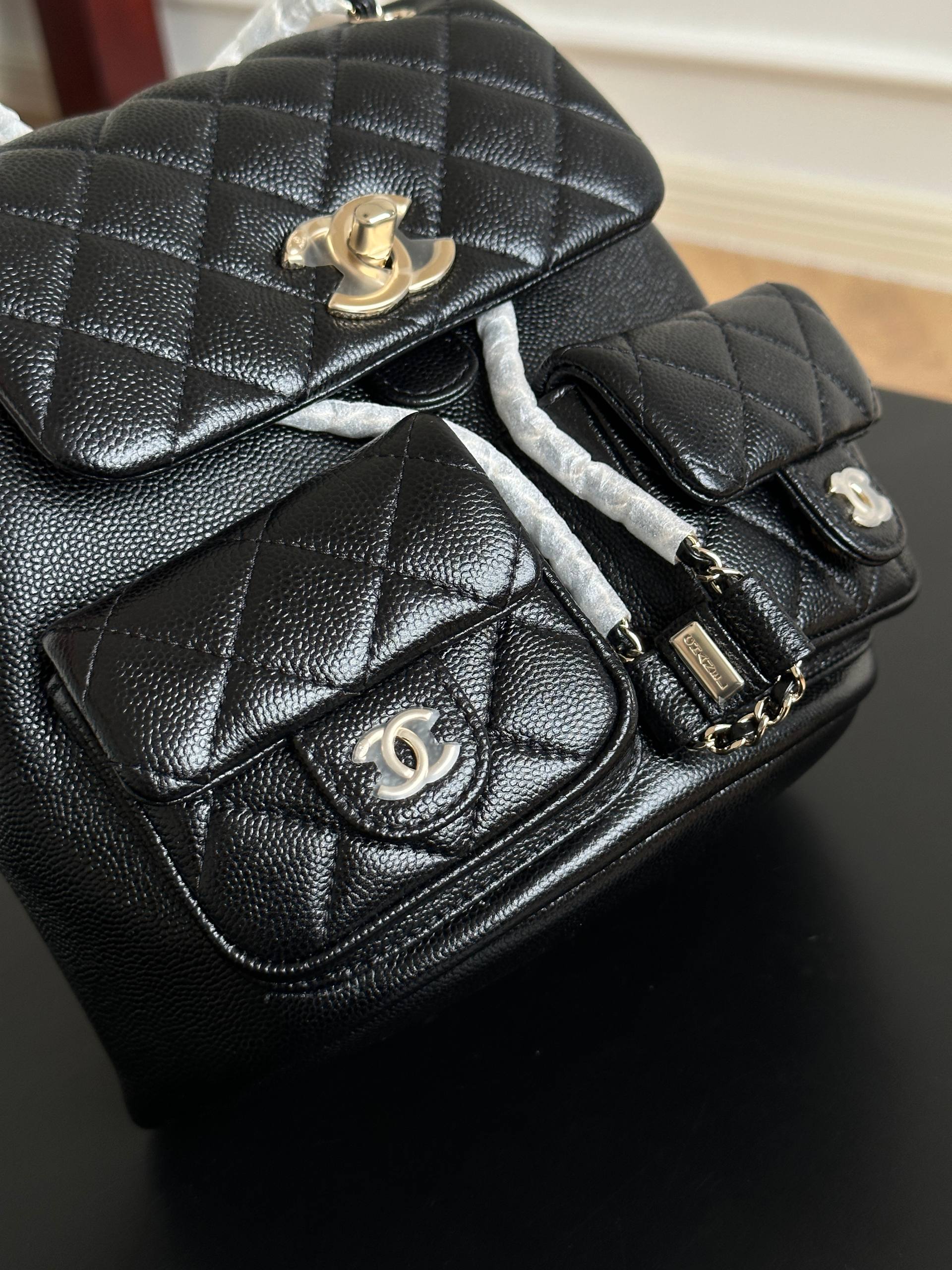 Chanel Black Caviar Quilted Double Pocket CC Drawstring Chain Mini Backpack