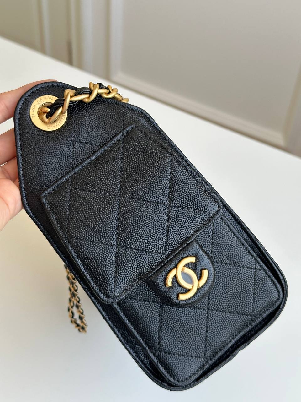 CHANEL Black Caviar Quilted Drawstring Bucket Bag with CC Logo