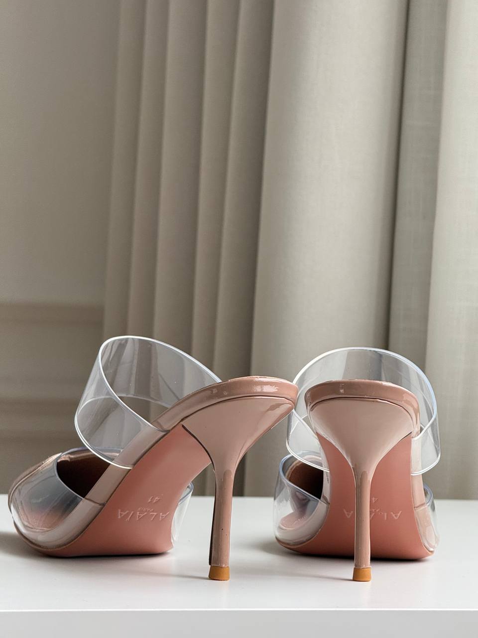 ALAÏA Heart PVC & Patent Leather Pointed-Toe Mules Nude