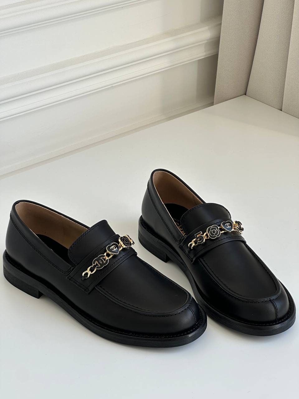 Chanel Black Smooth Calfskin Heart Camellia Interlocking CC Metal Chain Low Heel Loafers