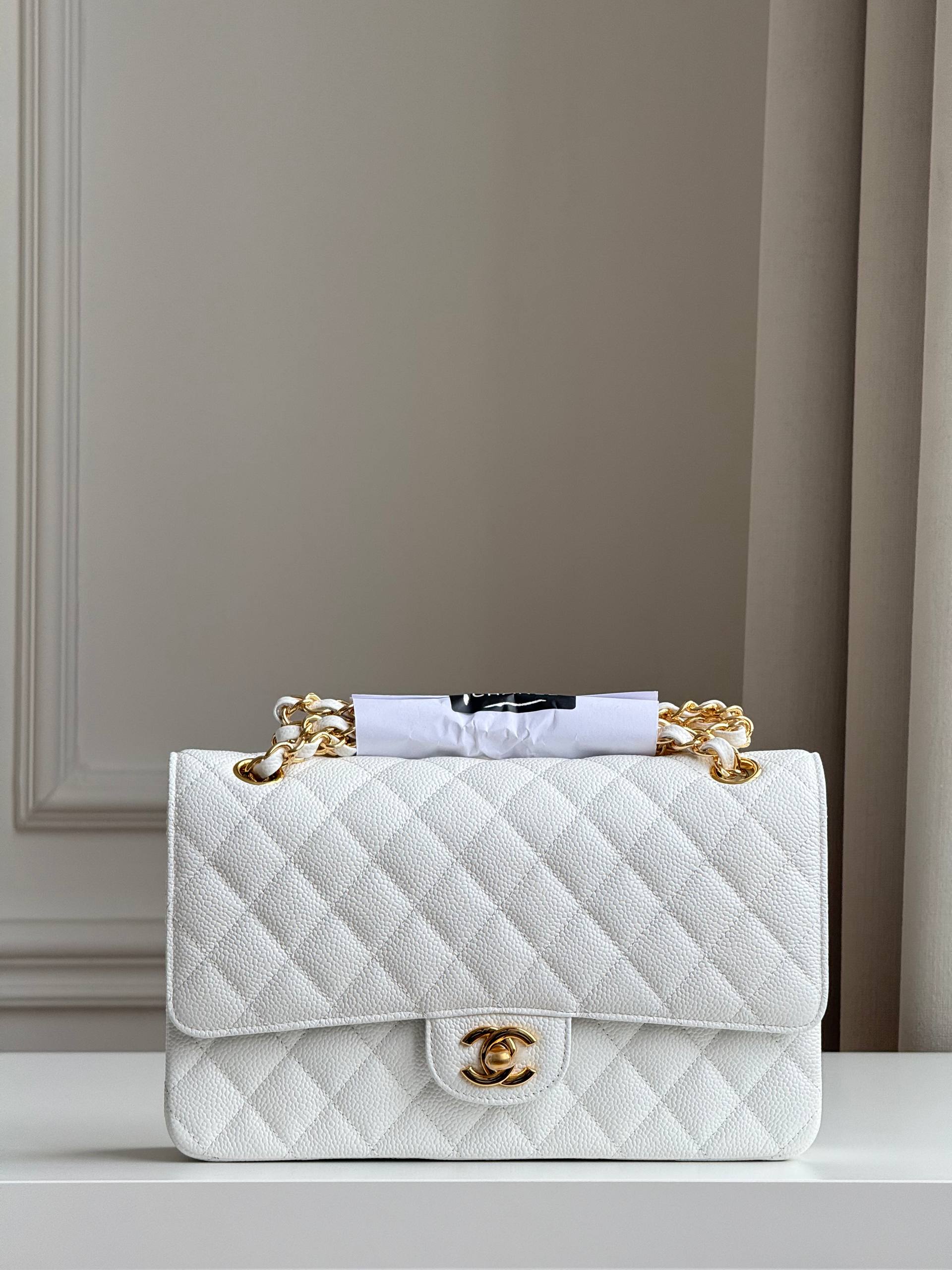 Medium-sized Chanel Classic Flap (CF) White Caviar Leather Gold-Tone Hardware Chain Bag