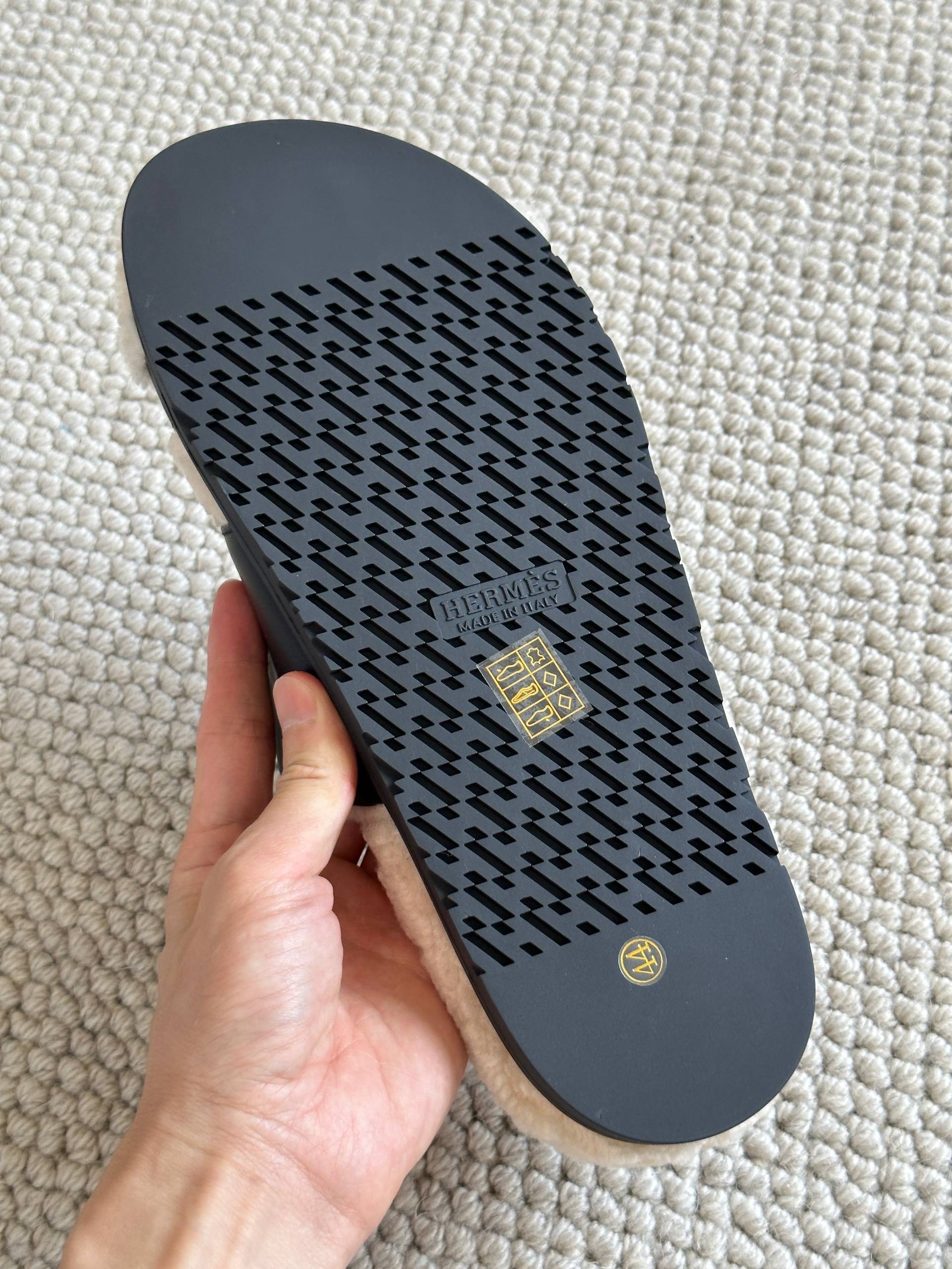Hermès Black Calfskin & Shearling Chypre Sandals