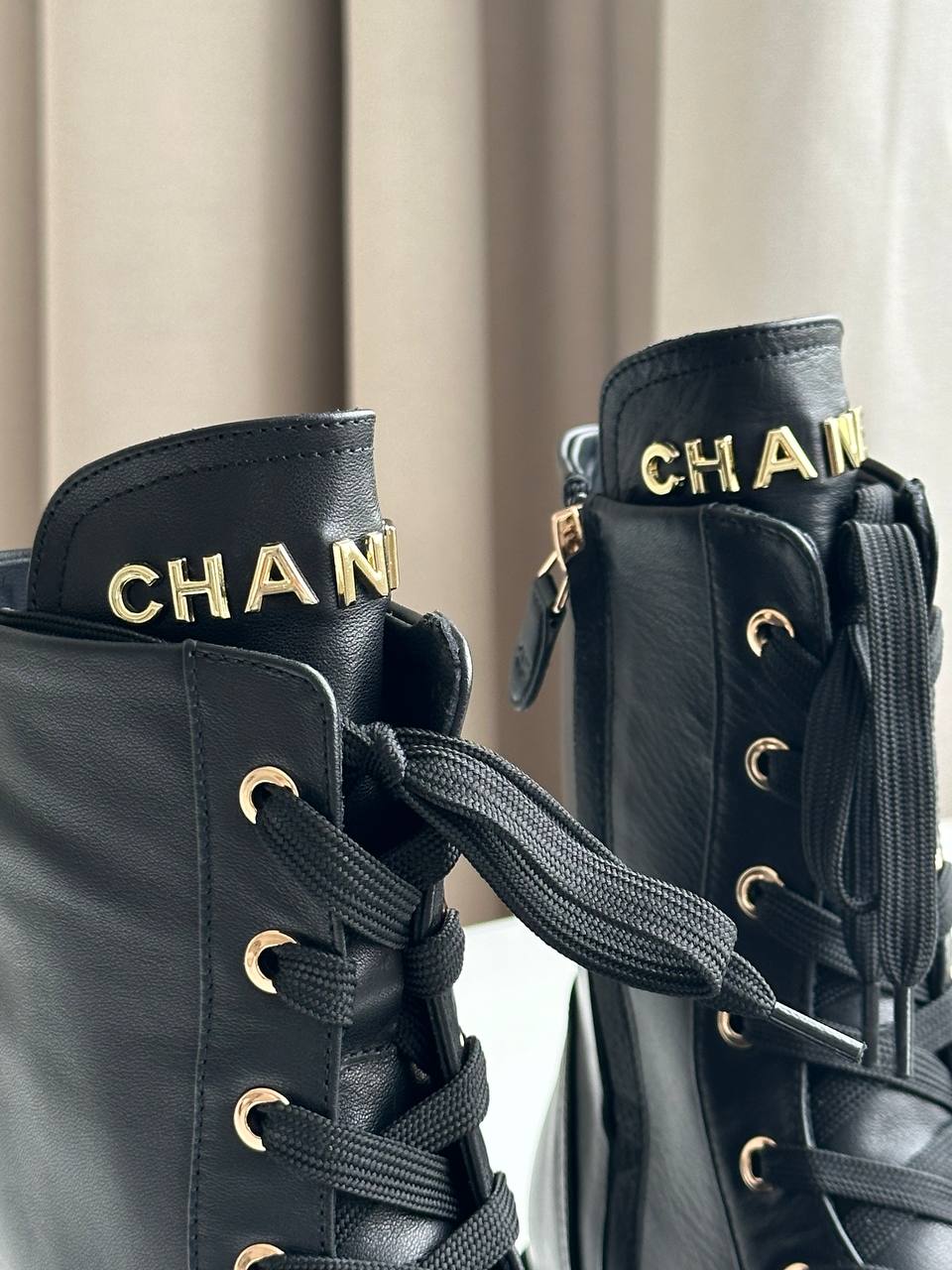 Chanel CC Embossed Leather Lace-Up Combat Boots