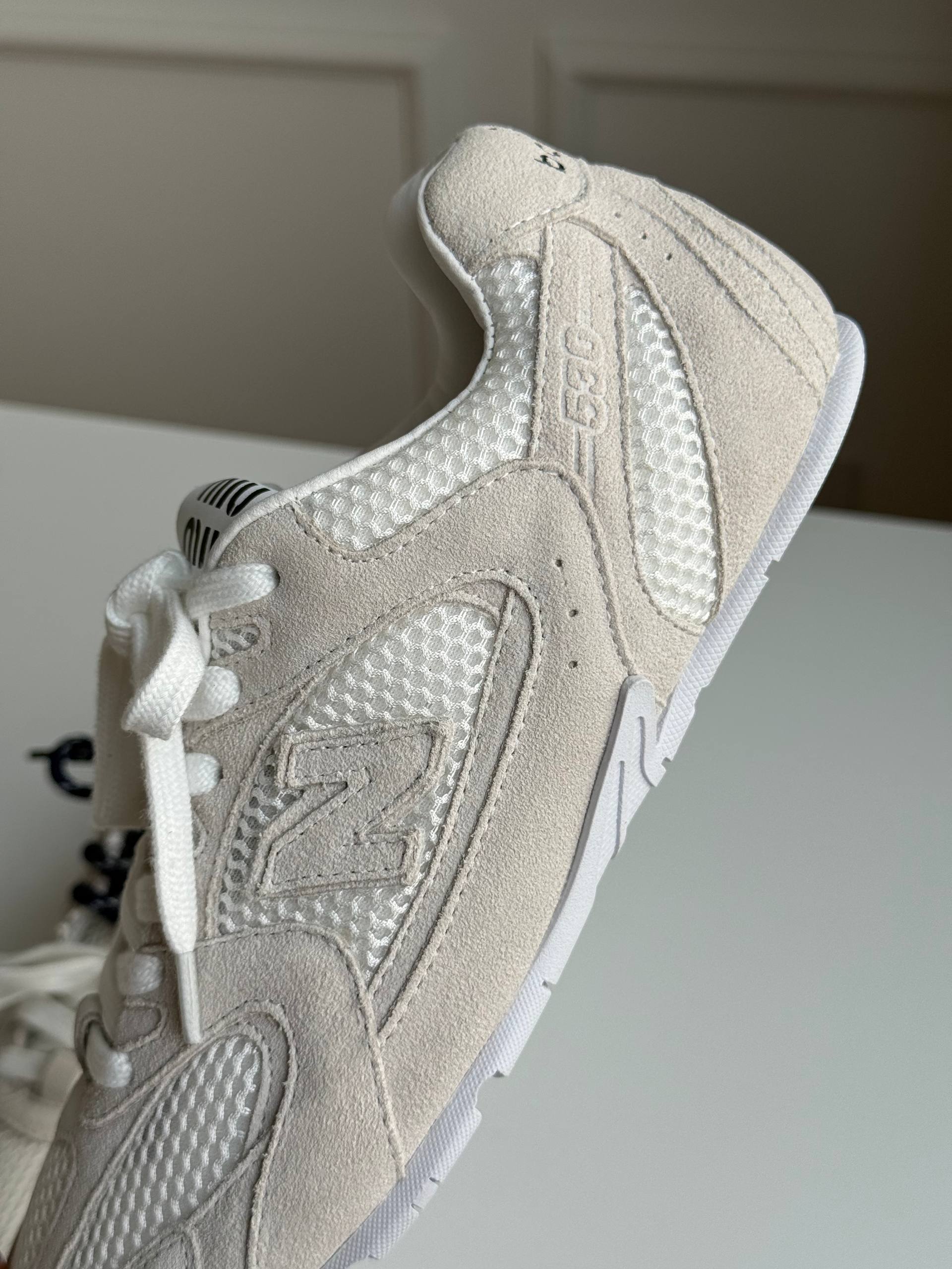 New Balance 530 retro running shoes in beige with mesh splicing