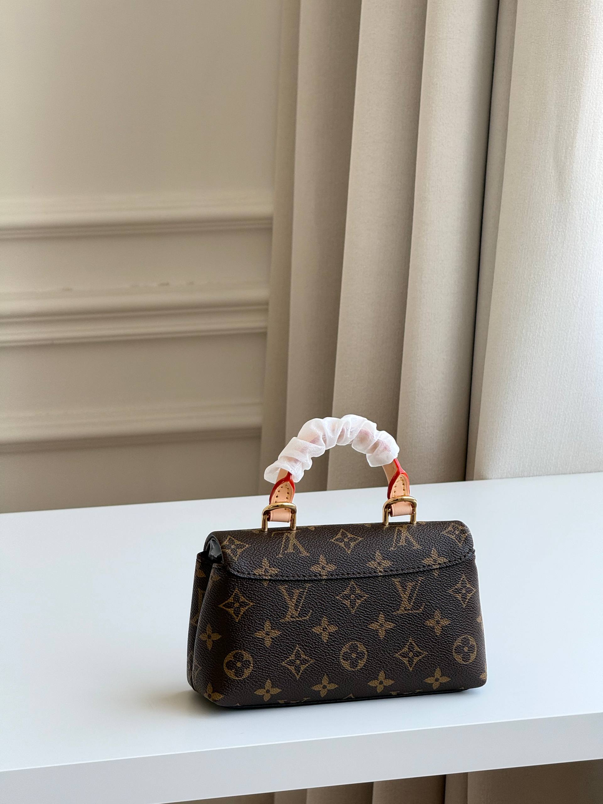 Louis Vuitton Nano Madeleine Monogram Handbag