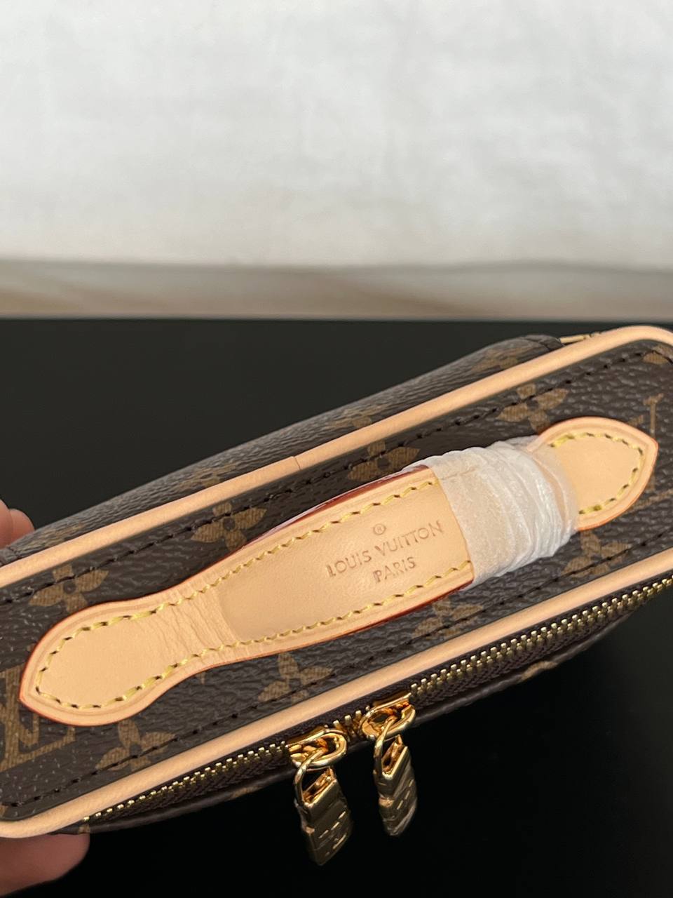 Louis Vuitton Mini Handheld Cosmetic Bag In Classic Monogram Coated Canvas