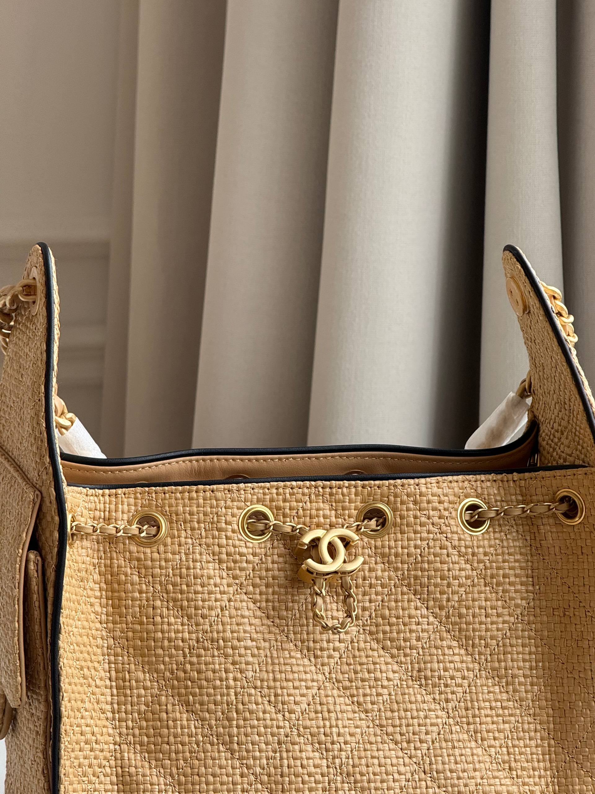 Chanel Quilted Raffia Drawstring Bucket Bag