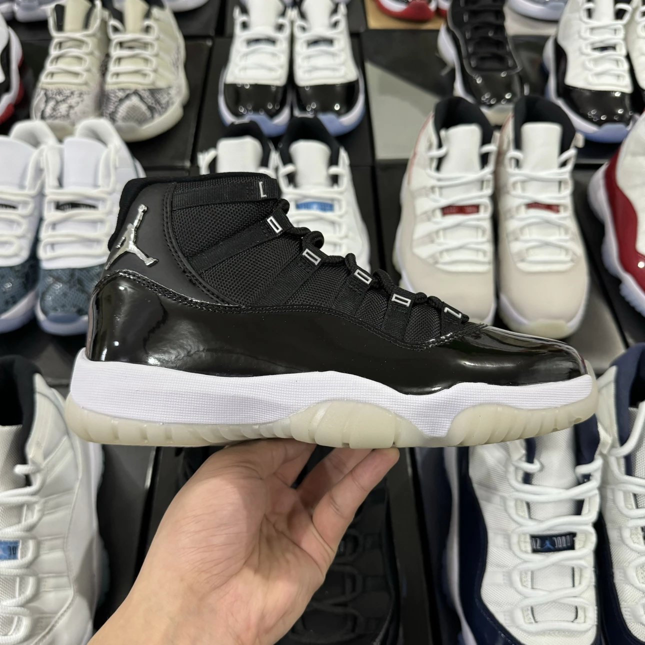 Air Jordan 11 Retro High Black with Silver Logo
