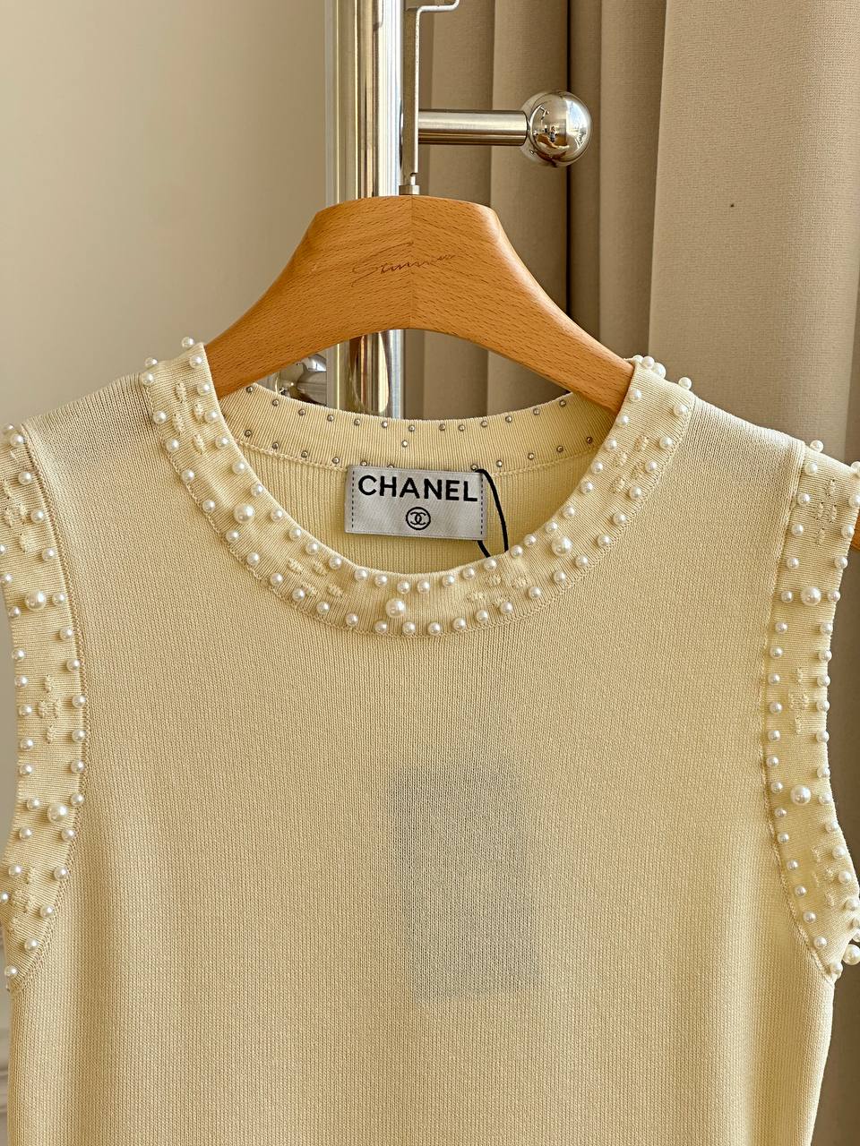 CHANEL Sleeveless Knit Dress with Pearl Trim and Openwork Pleated Hem