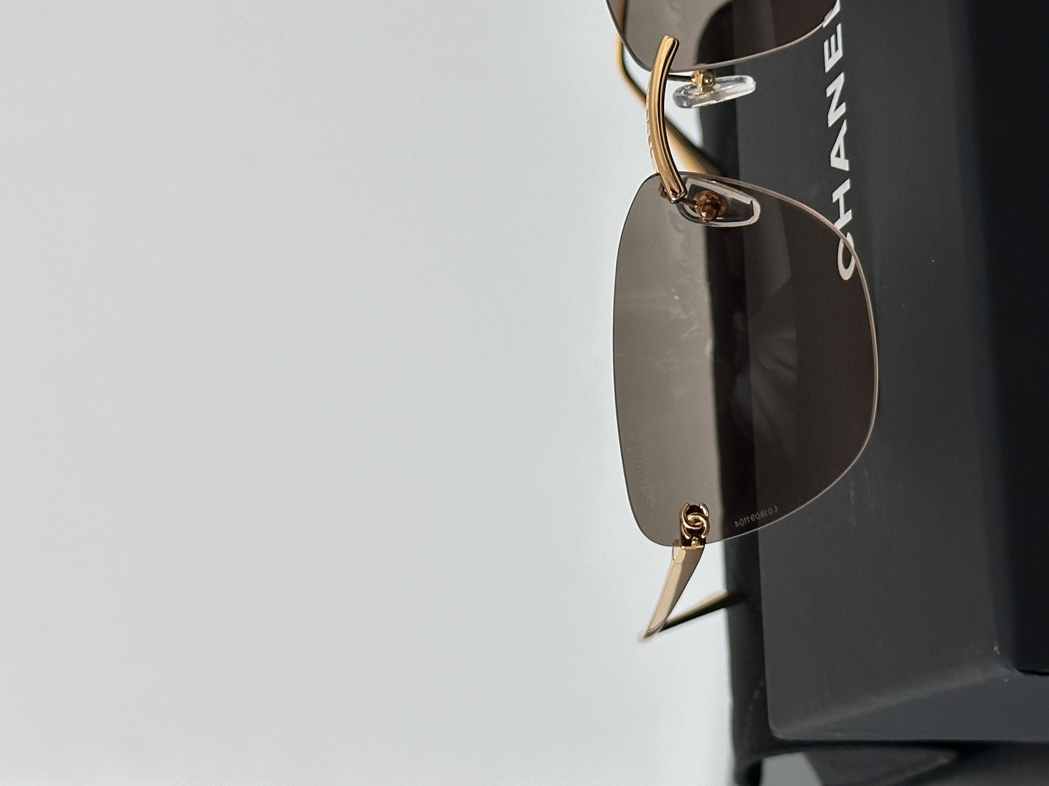 CHANEL Rimless Metal CC Cut Gradient Brown Sunglasses