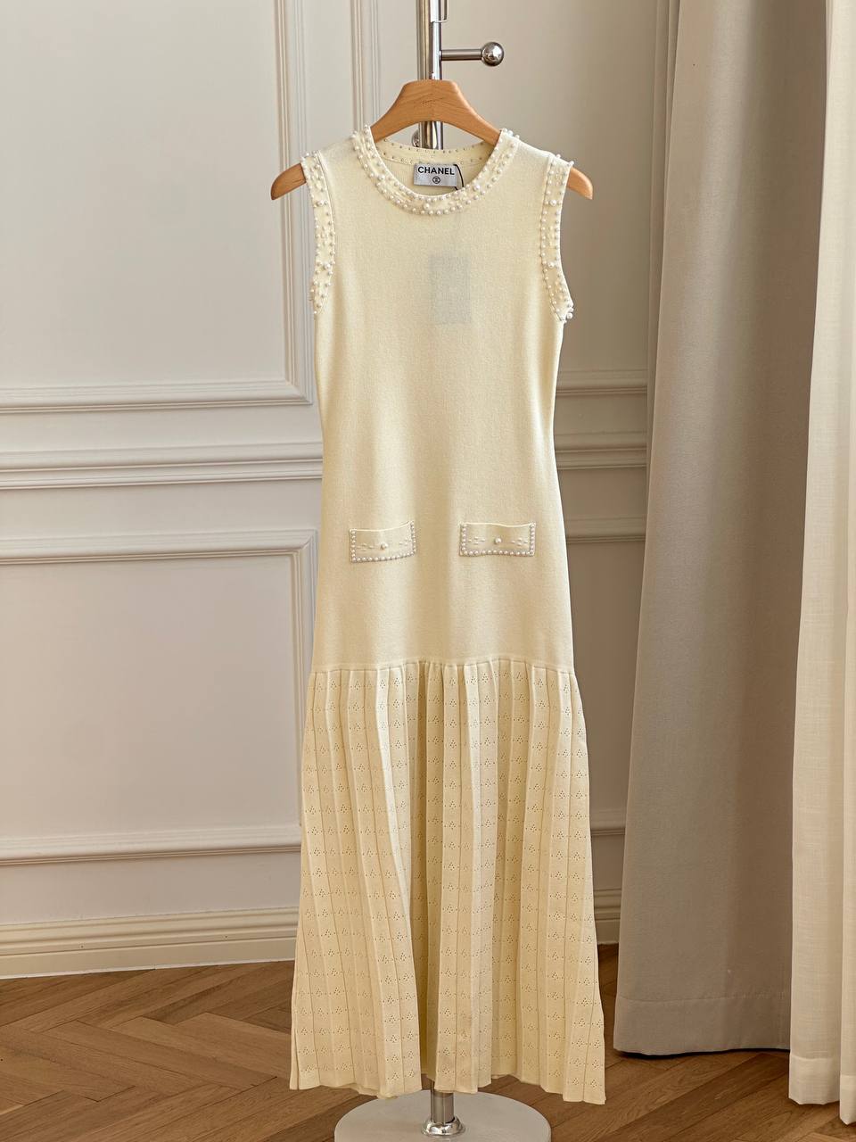 CHANEL Sleeveless Knit Dress with Pearl Trim and Openwork Pleated Hem