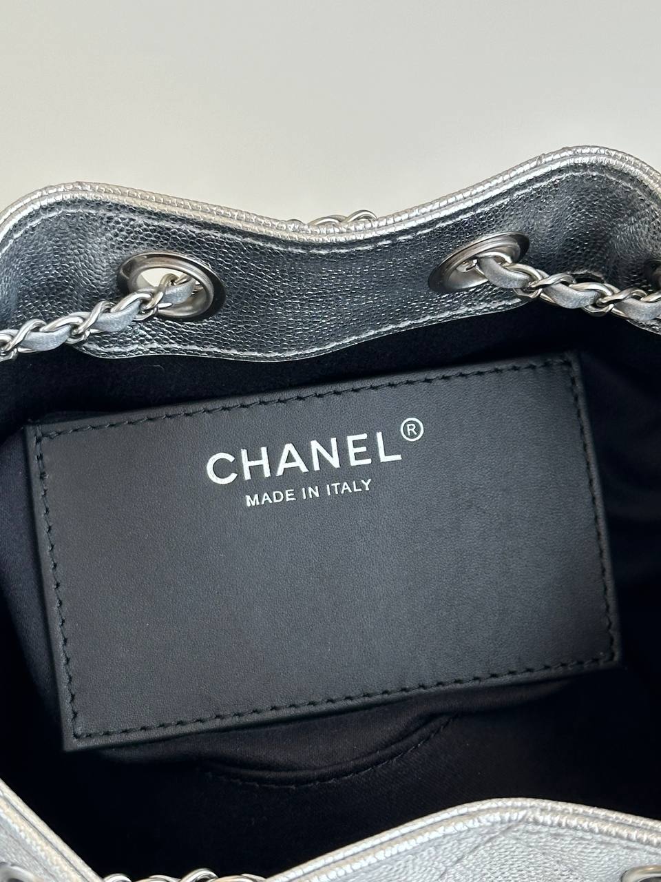 CHANEL Metallic Caviar Quilted Drawstring Bucket Bag