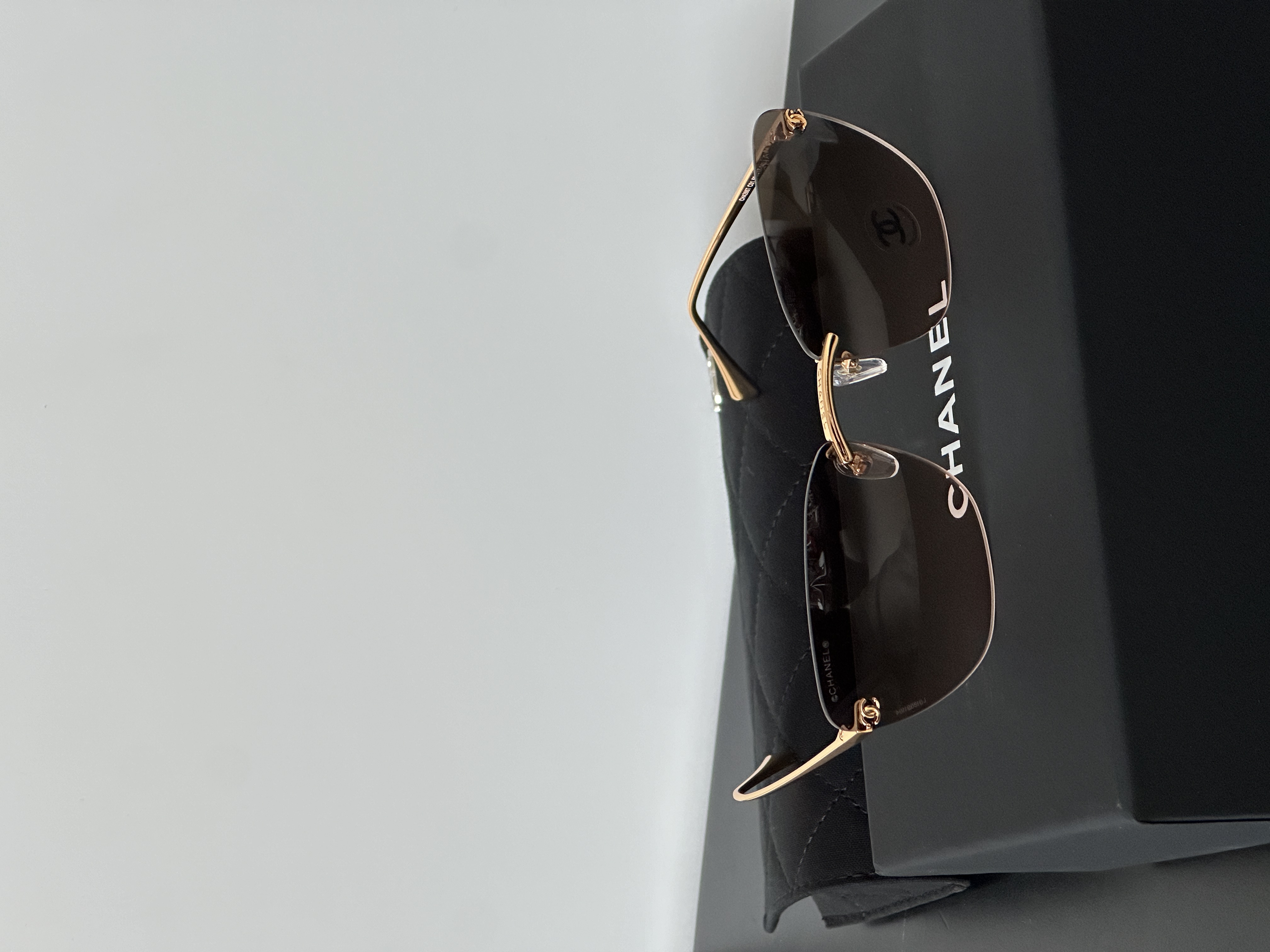 CHANEL Rimless Metal CC Cut Gradient Brown Sunglasses