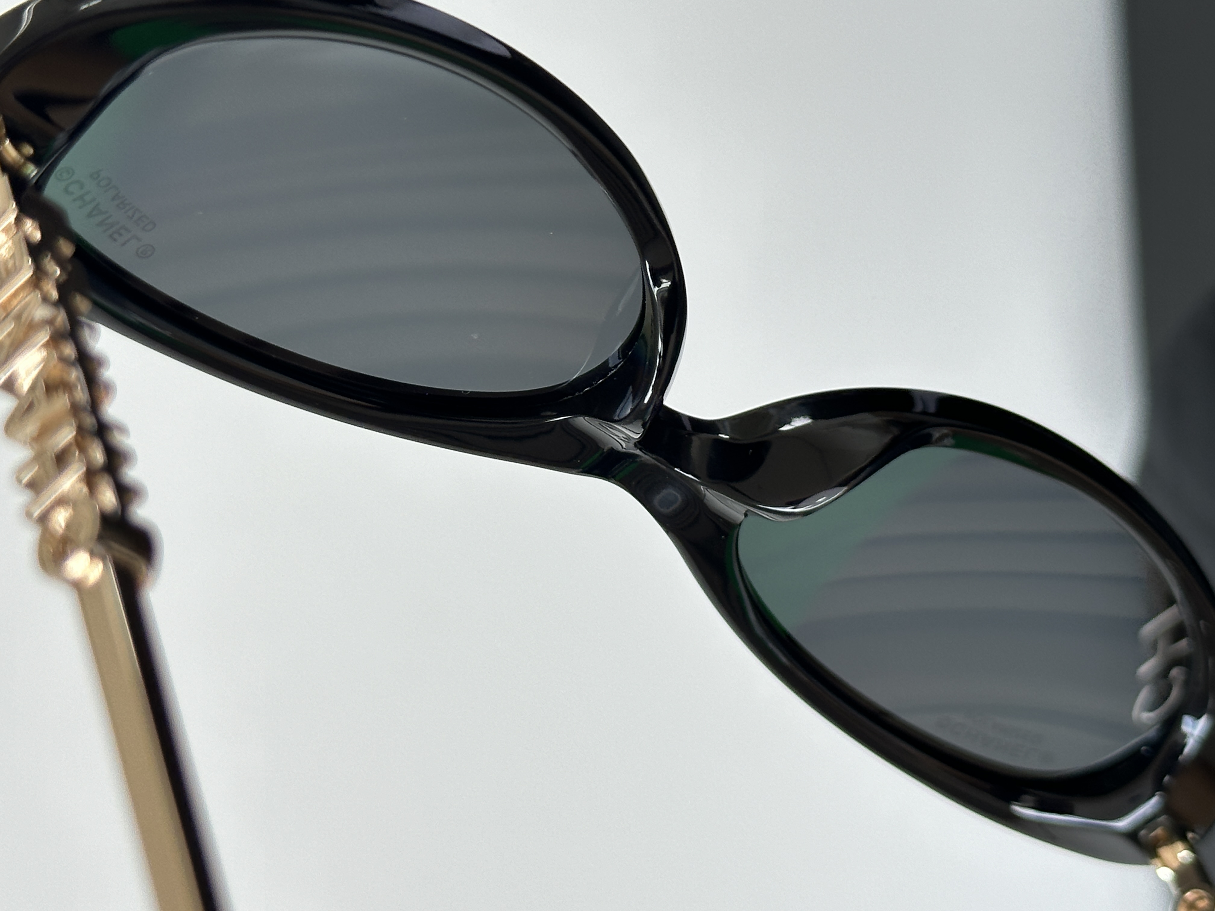 Chanel Black Oval Acetate Chain Temple Polarized Sunglasses