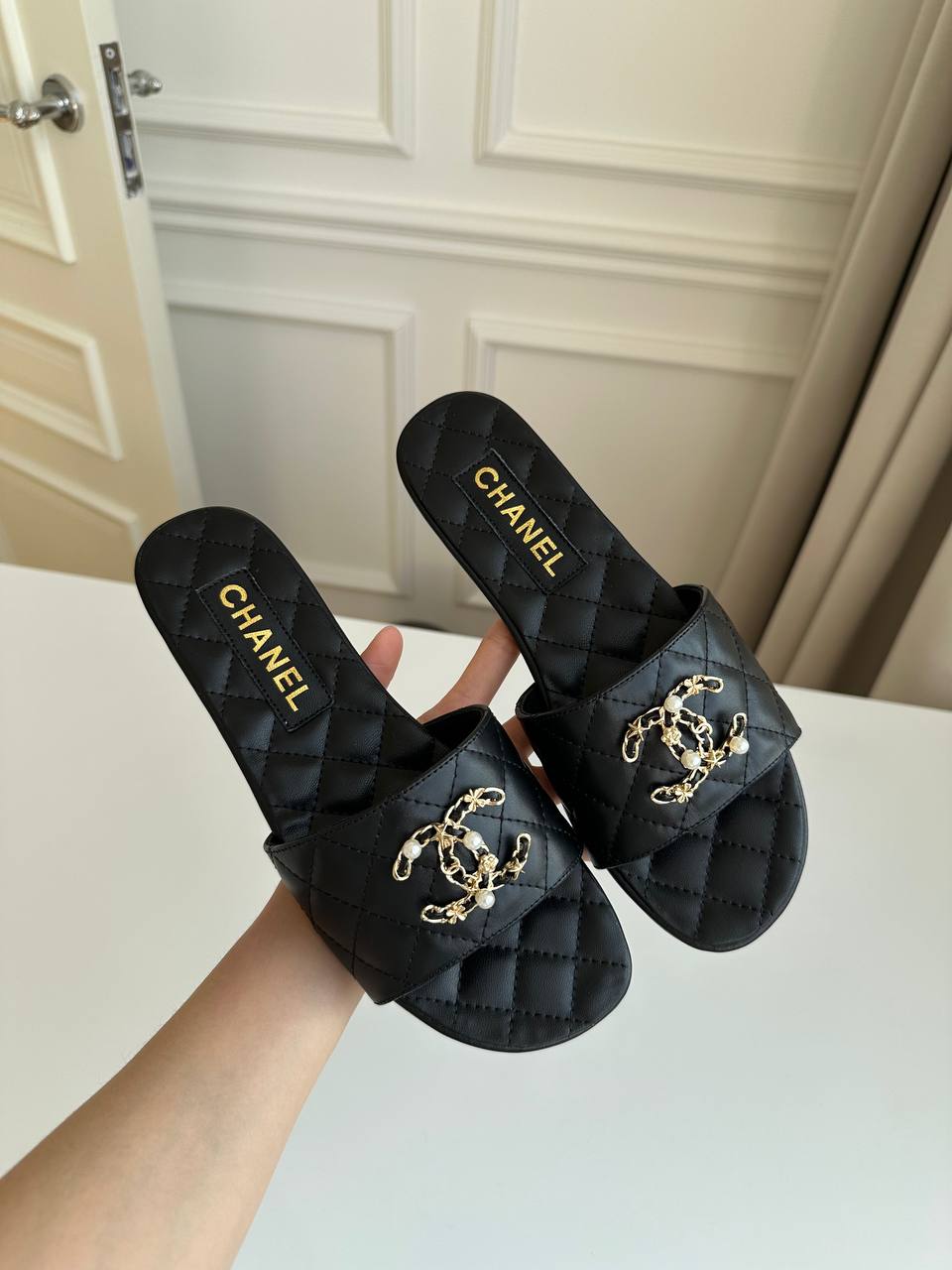 Chanel Black Quilted Lambskin Pearl Chain CC Logo Flat Slide Sandals