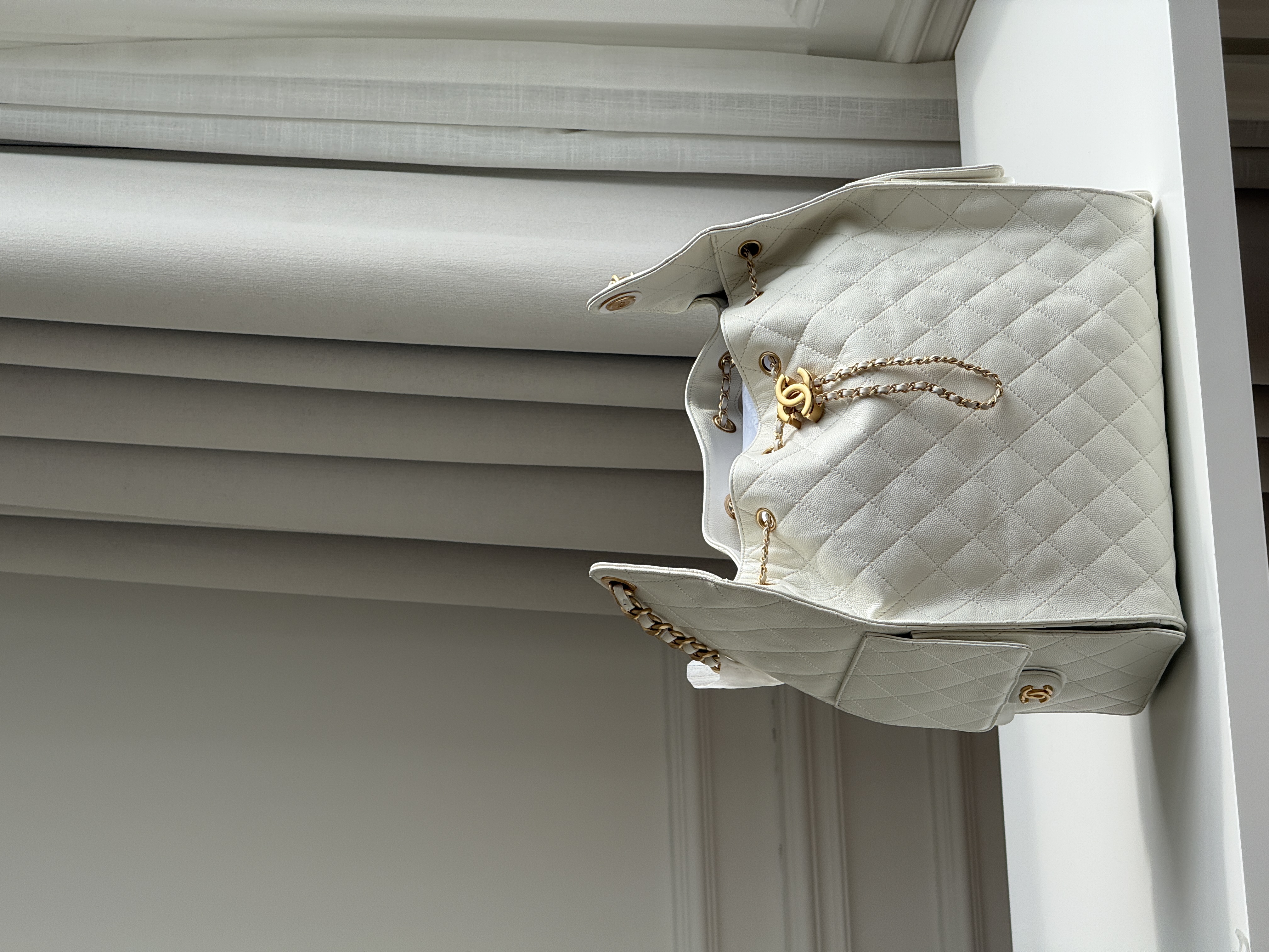 CHANEL Quilted Drawstring Bucket Bag in Milky White