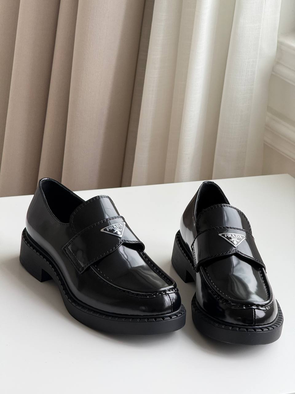Prada Monolith Brushed Leather Loafers