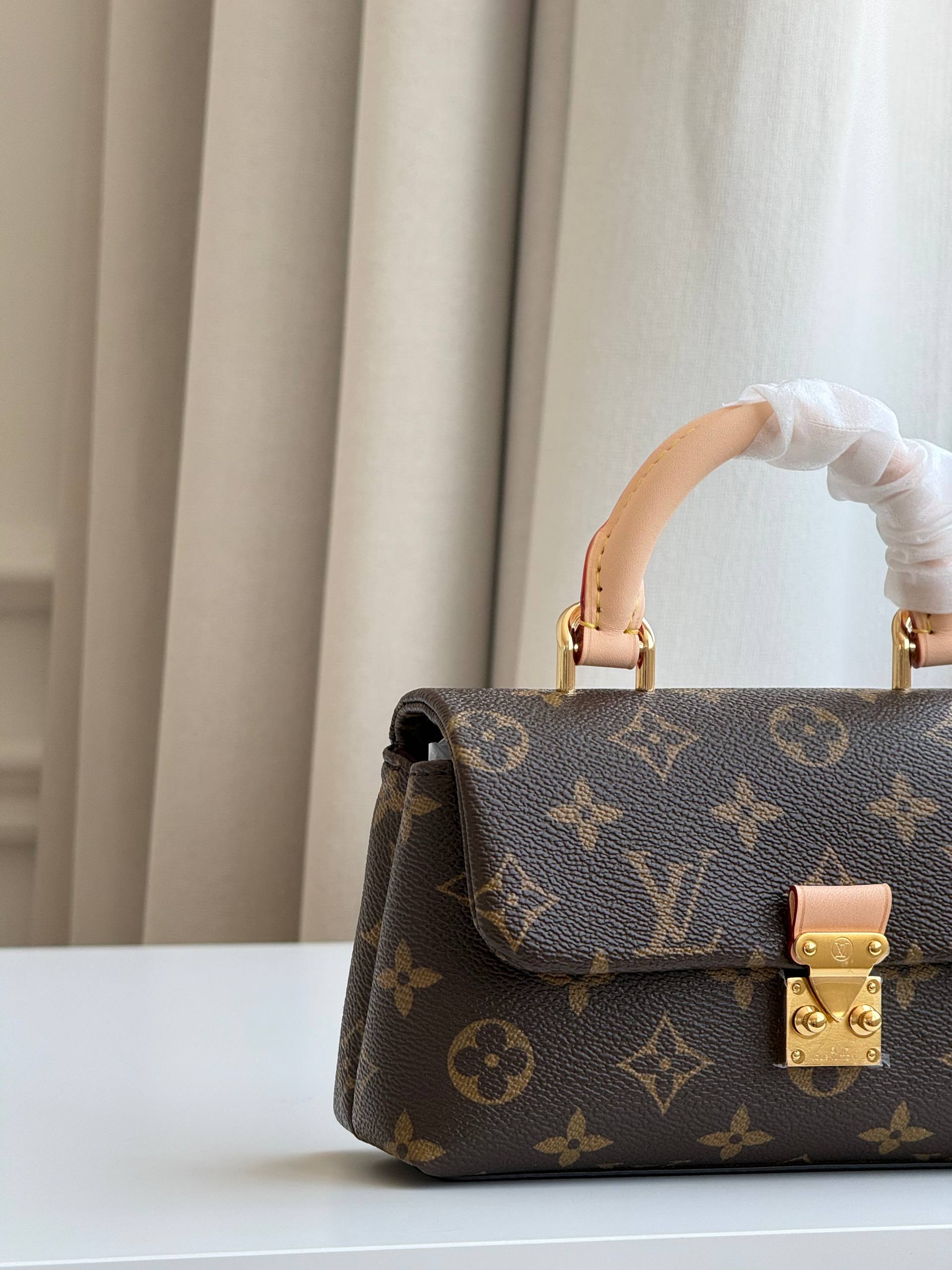 Louis Vuitton Nano Madeleine Monogram Handbag
