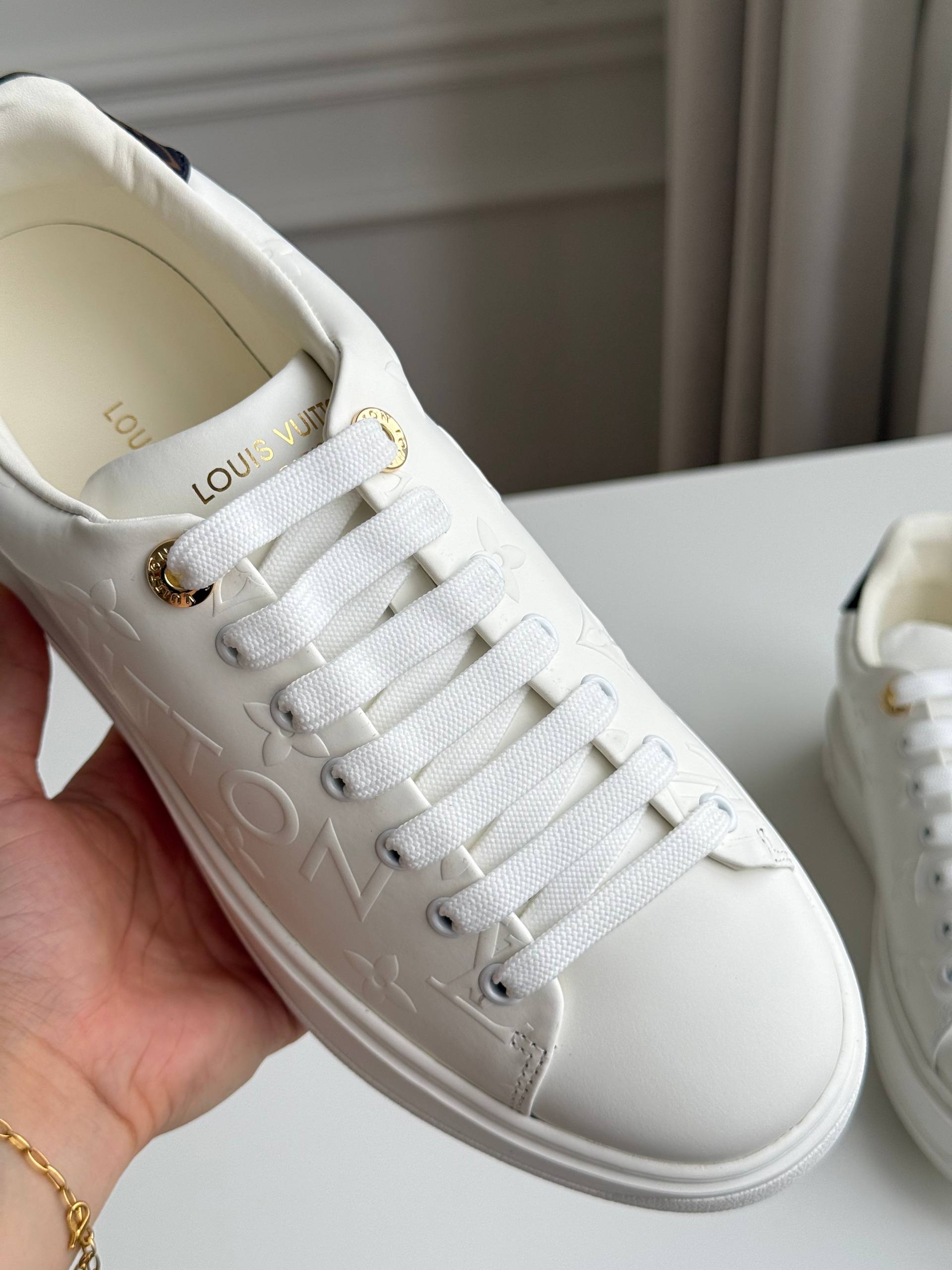 LV White Sneakers / Time Out Monogram Embossed Sneakers