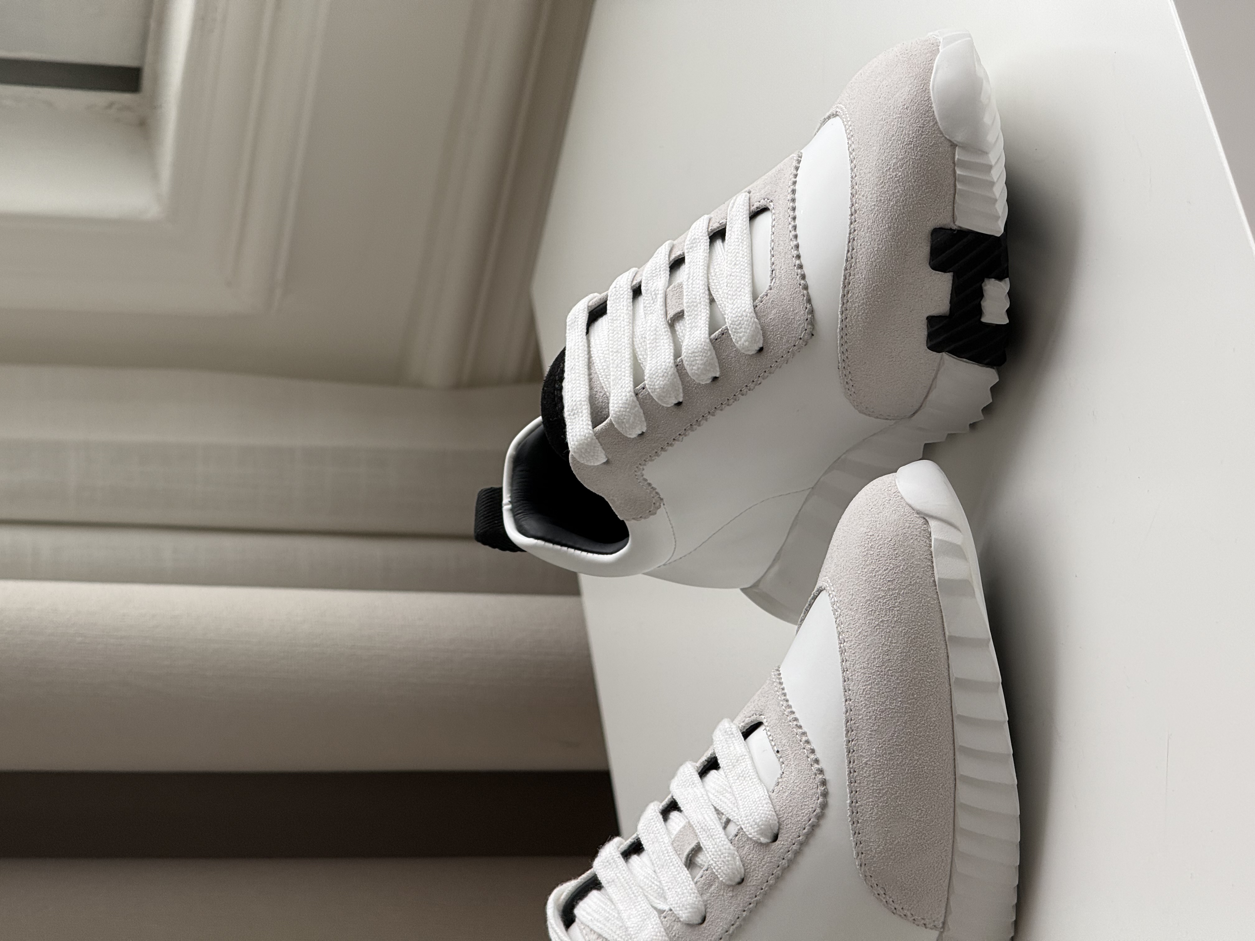 Hermès Bouncing Sneakers in White & Black