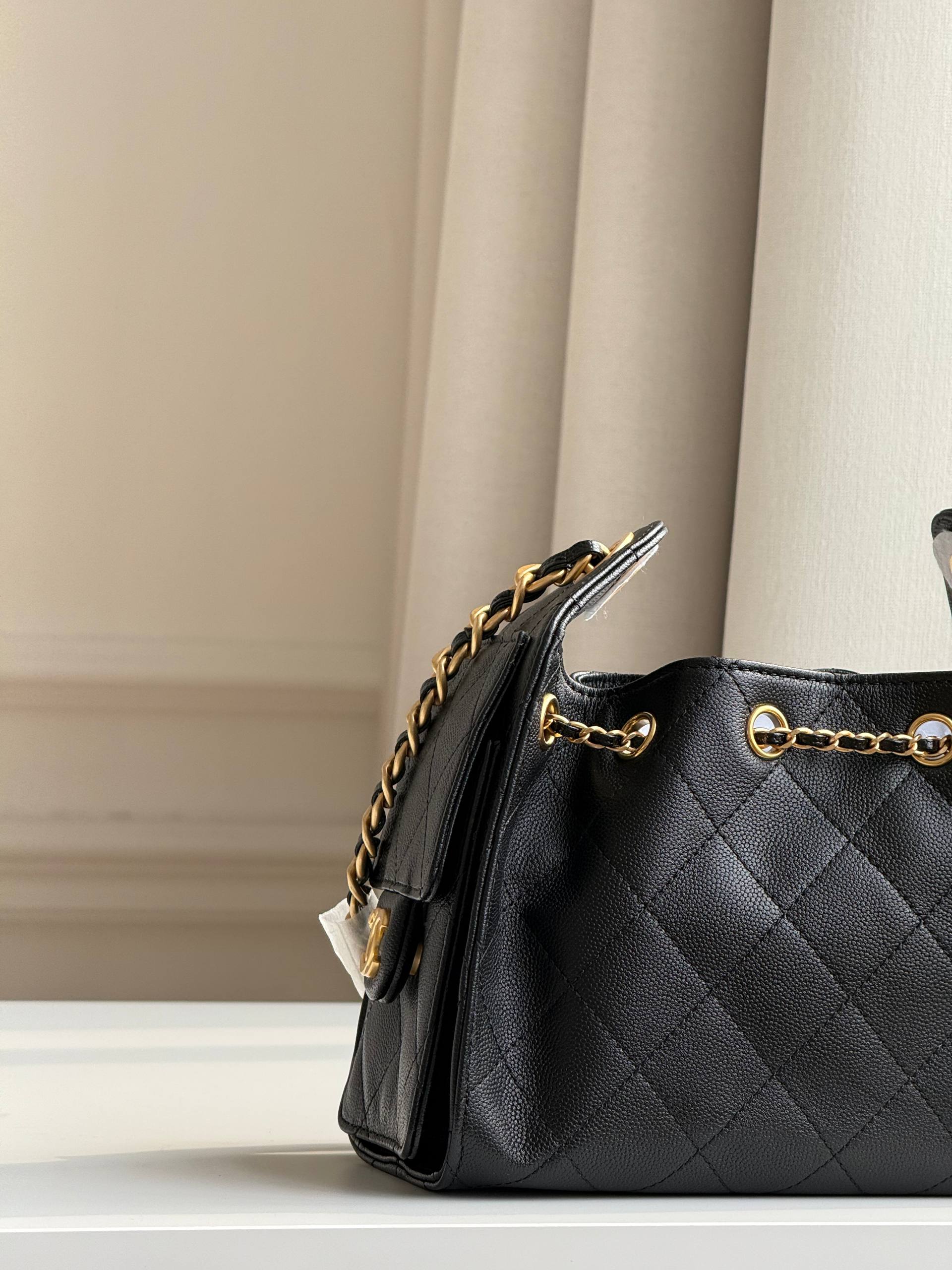 Chanel Caviar Leather Drawstring Bucket Bag with Chain Strap