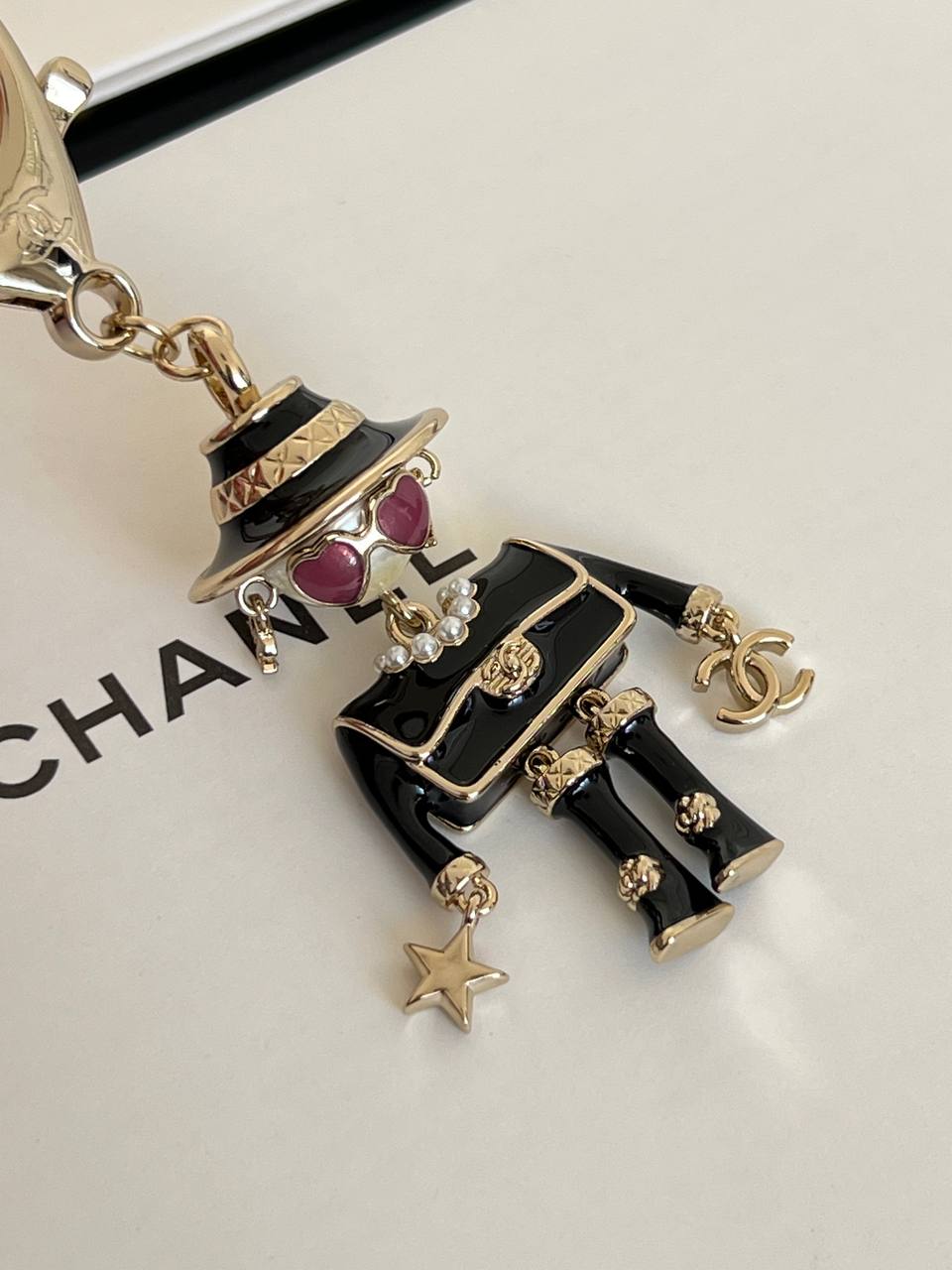 Chanel Doll Pearl Enamel Metal Keychain Bag Charm