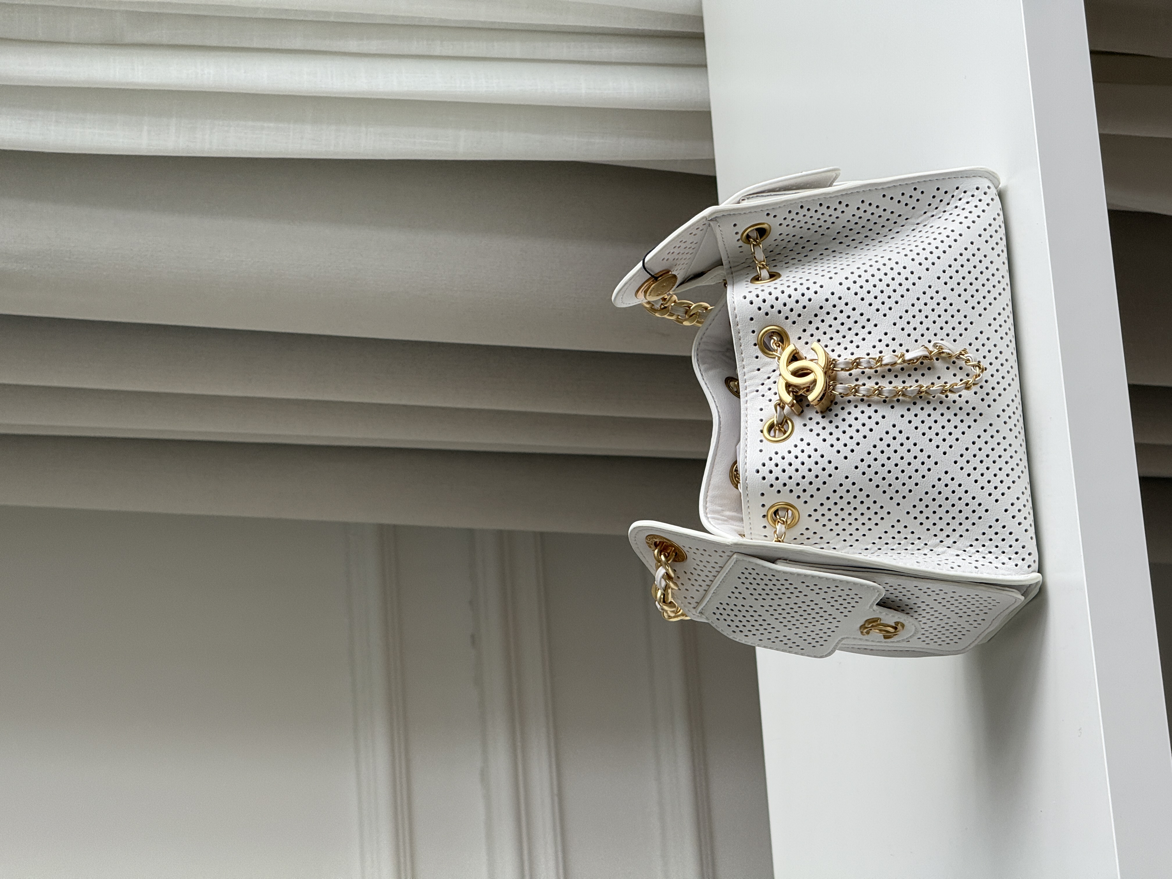 CHANEL 25 Mini Perforated Calfskin Bucket Bag
