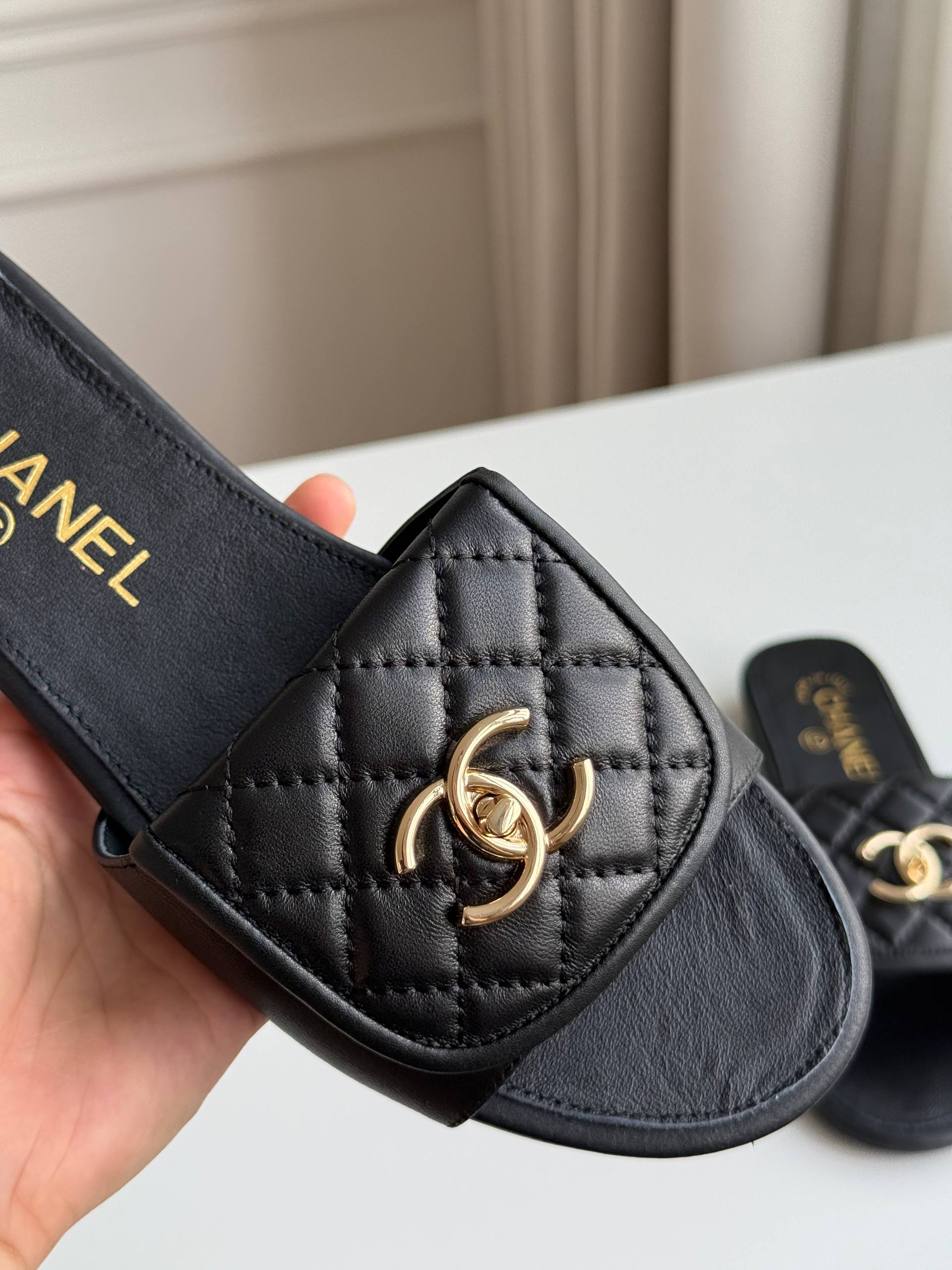 CHANEL QUILTED CC TURNLOCK FLAT MULES