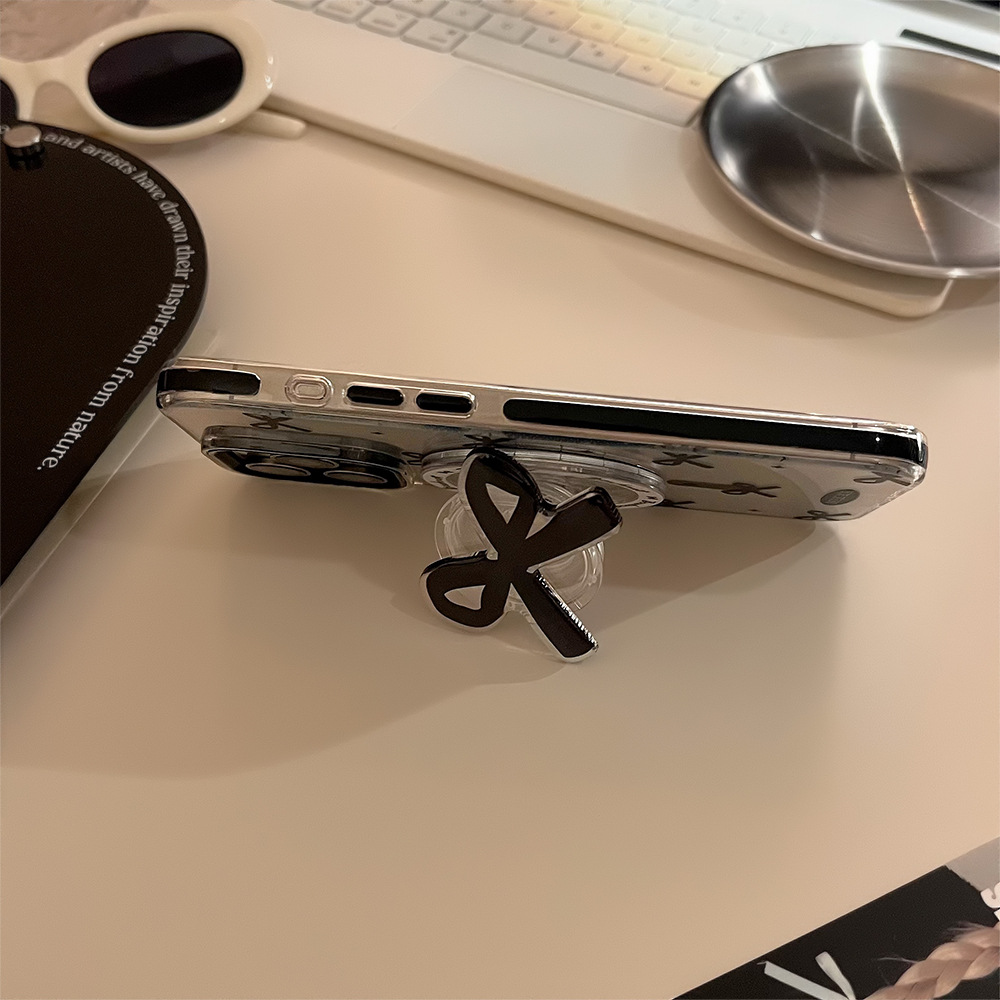 Black bow magnetic case 17Promax transparent iPhone case
