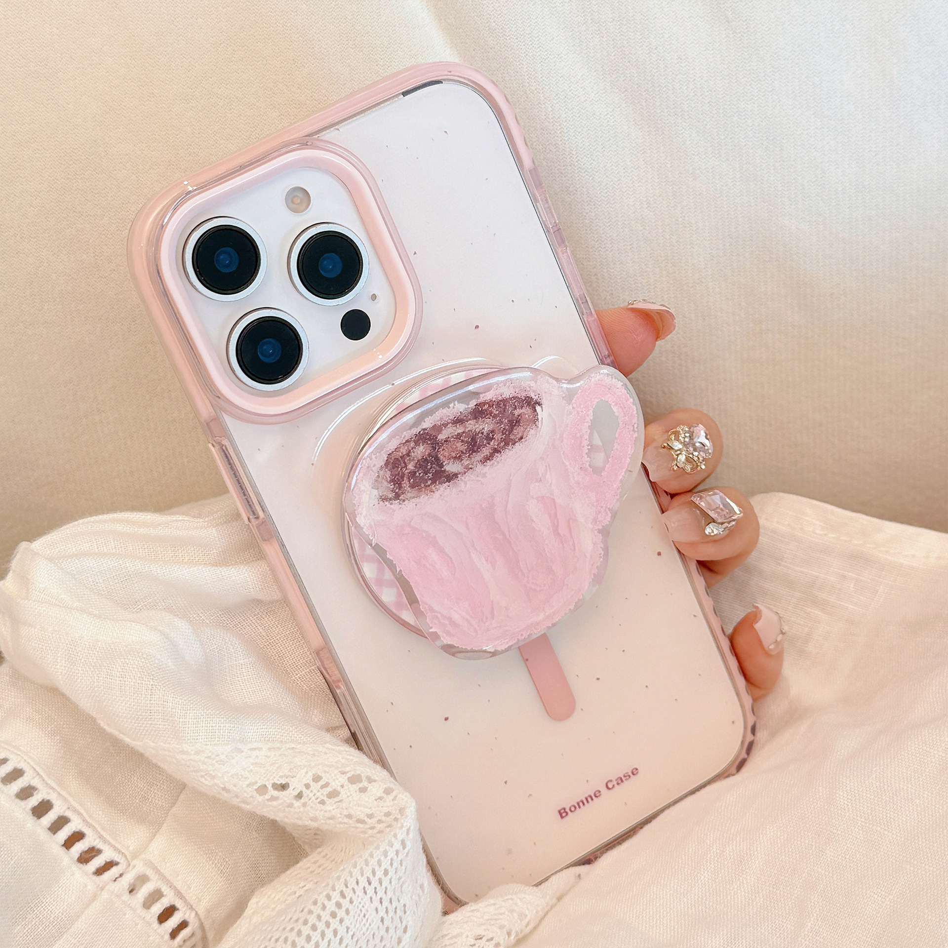 Magnetic bracket is suitable for Apple 16promax mobile phone case pink coffee cup iPhone17 anti-fall