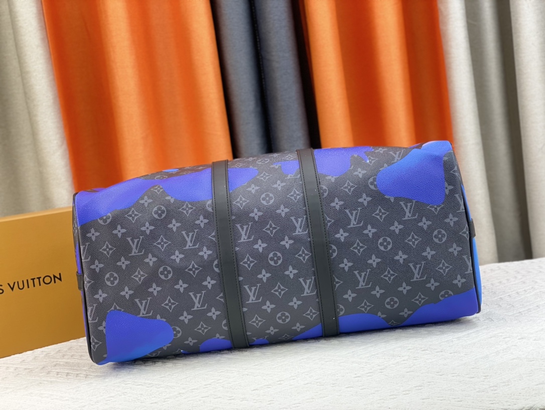 Louis Vuitton Keepall Bandoulière 55 travel bag