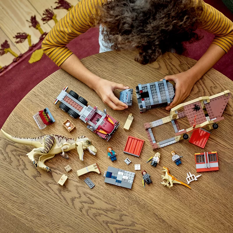 - JURASSIC WORLD T. REX & ATROCIRAPTOR DINOSAUR BREAKOUT 76948