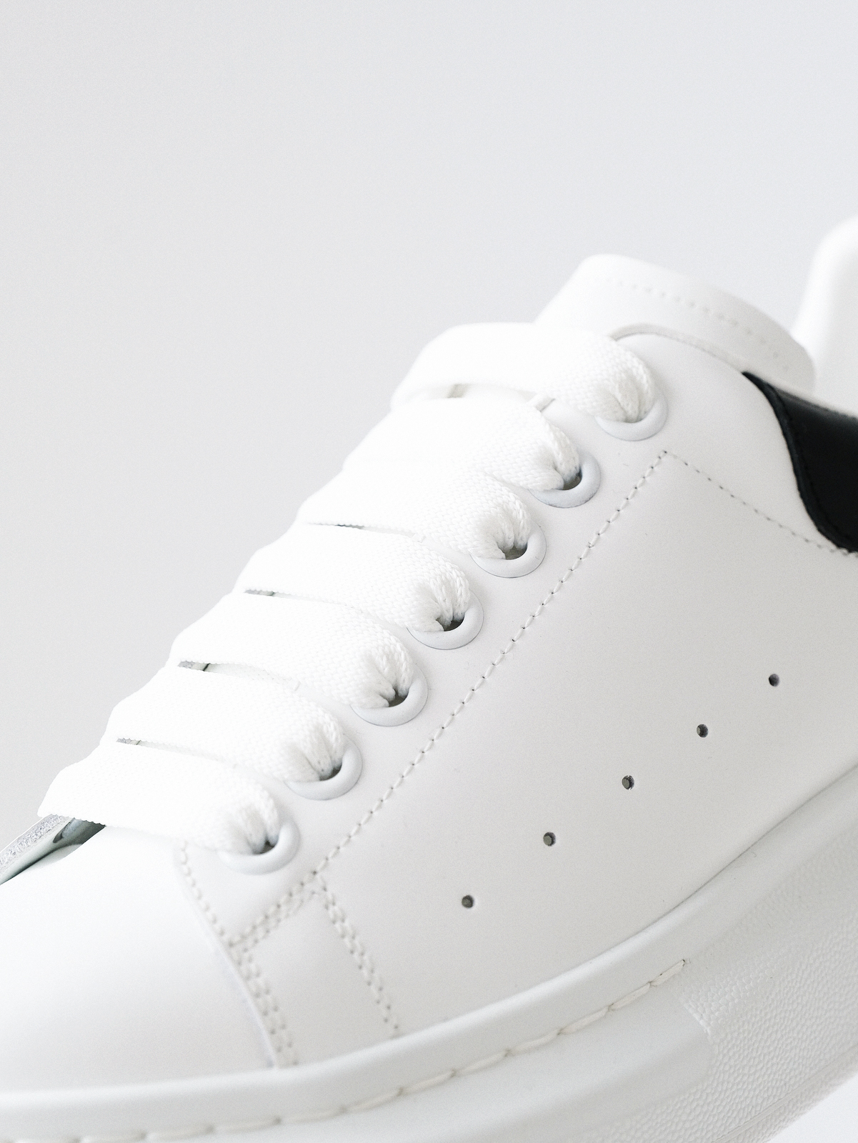 McQueen's classic little white shoes