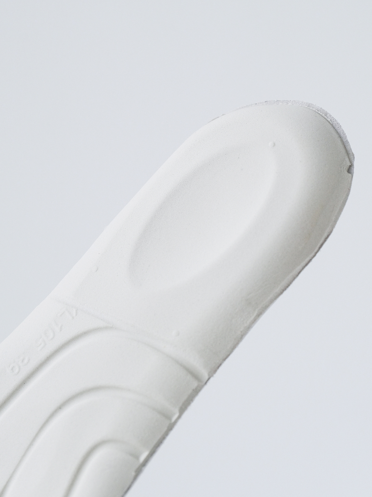 McQueen's classic little white shoes