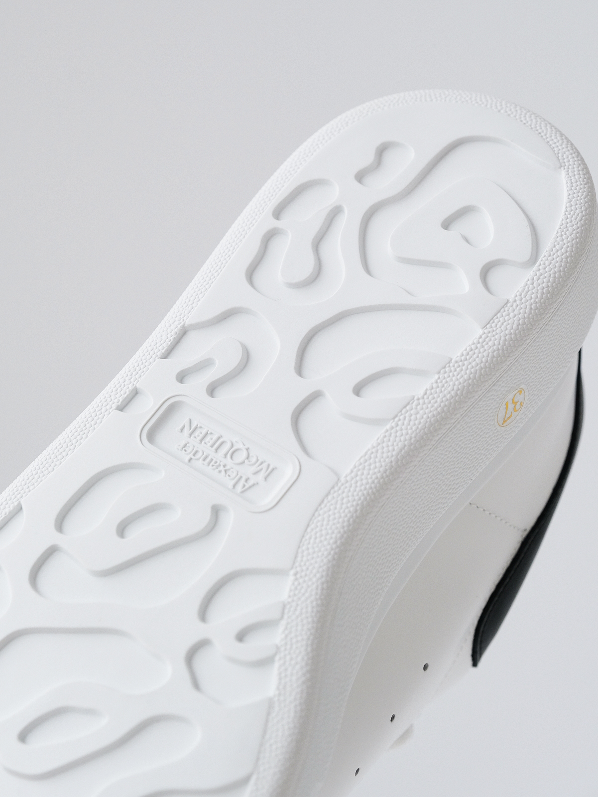 McQueen's classic little white shoes