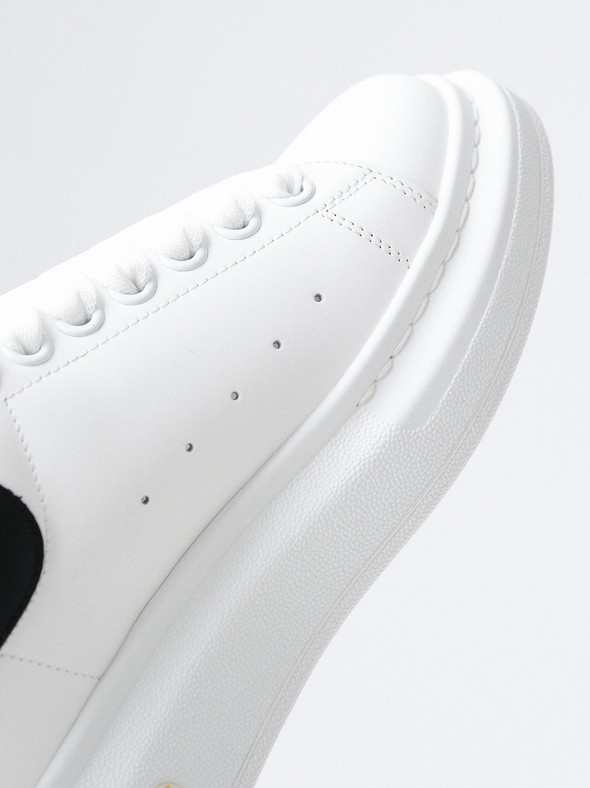 McQueen's classic little white shoes