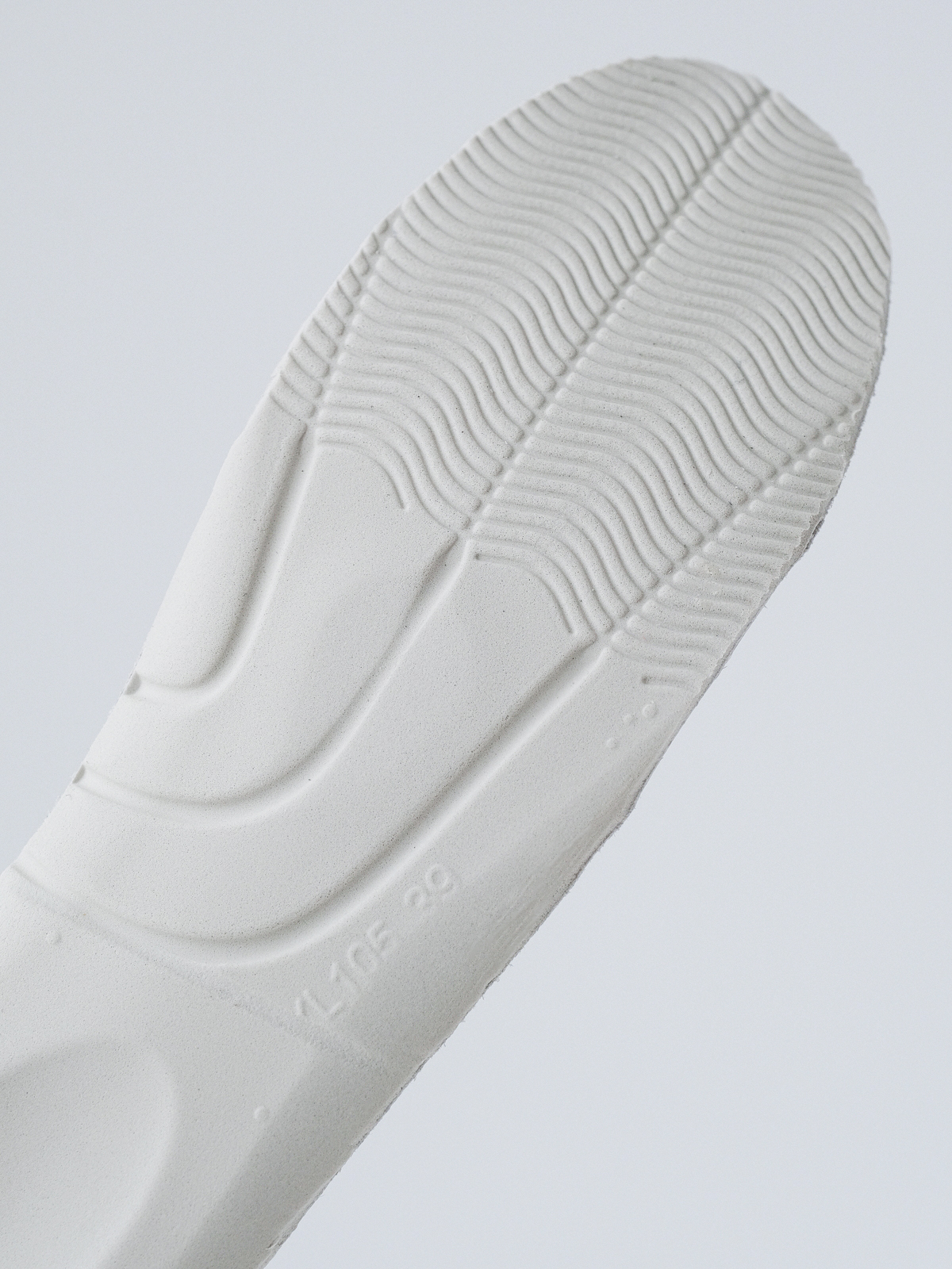 McQueen's classic little white shoes