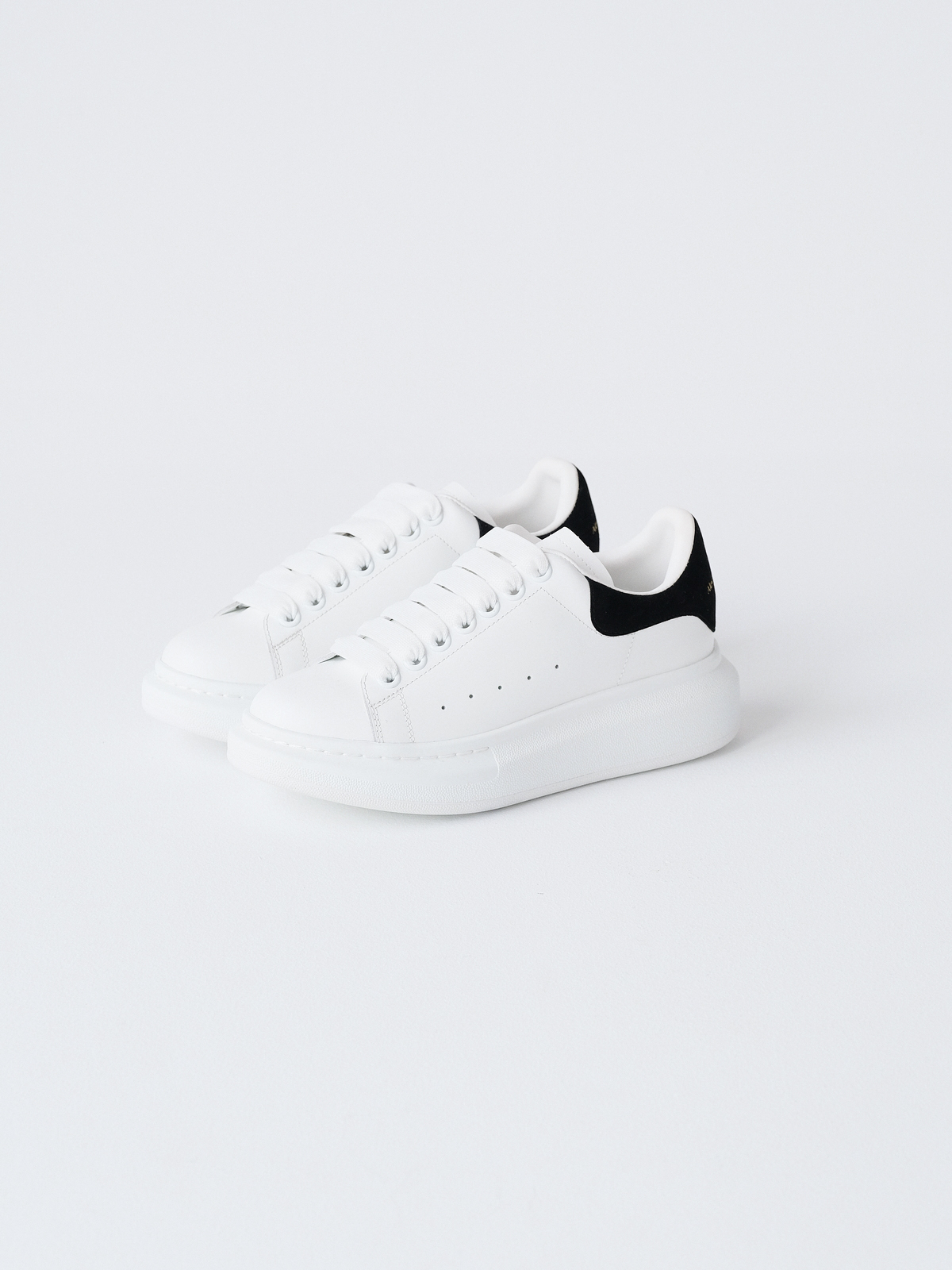 McQueen's classic little white shoes