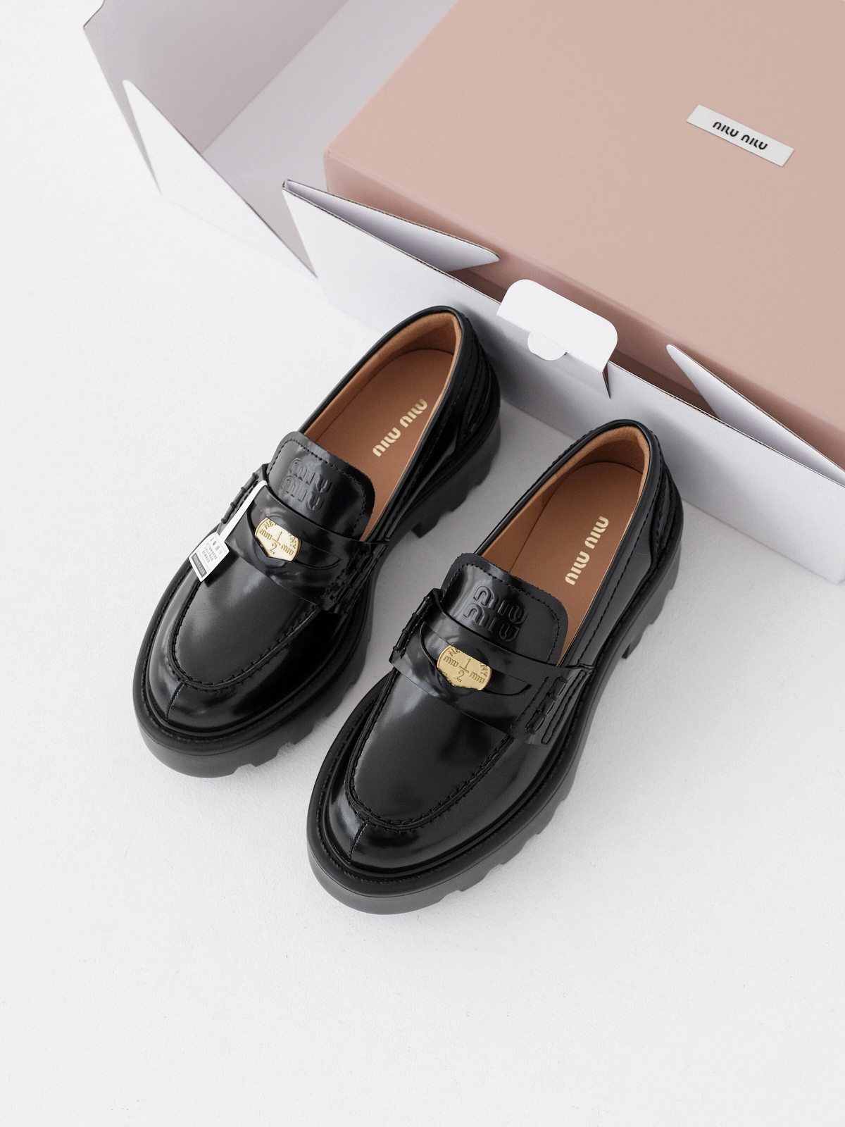 Miumiu thick-soled coin loafers