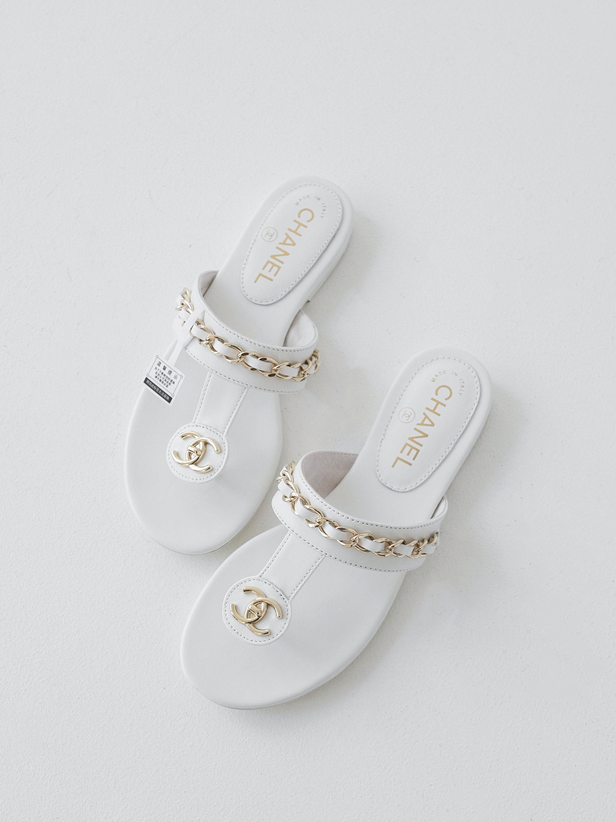 Chanel  Black gold chain flip-flops