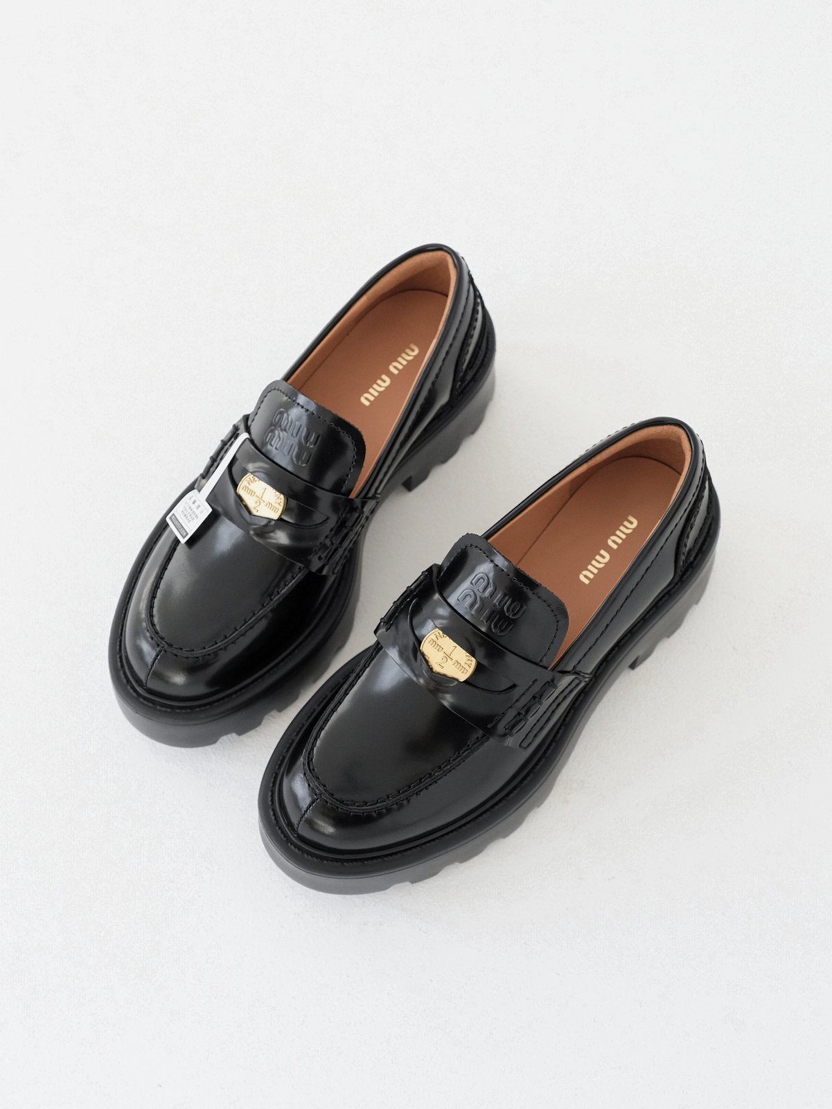 Miumiu thick-soled coin loafers