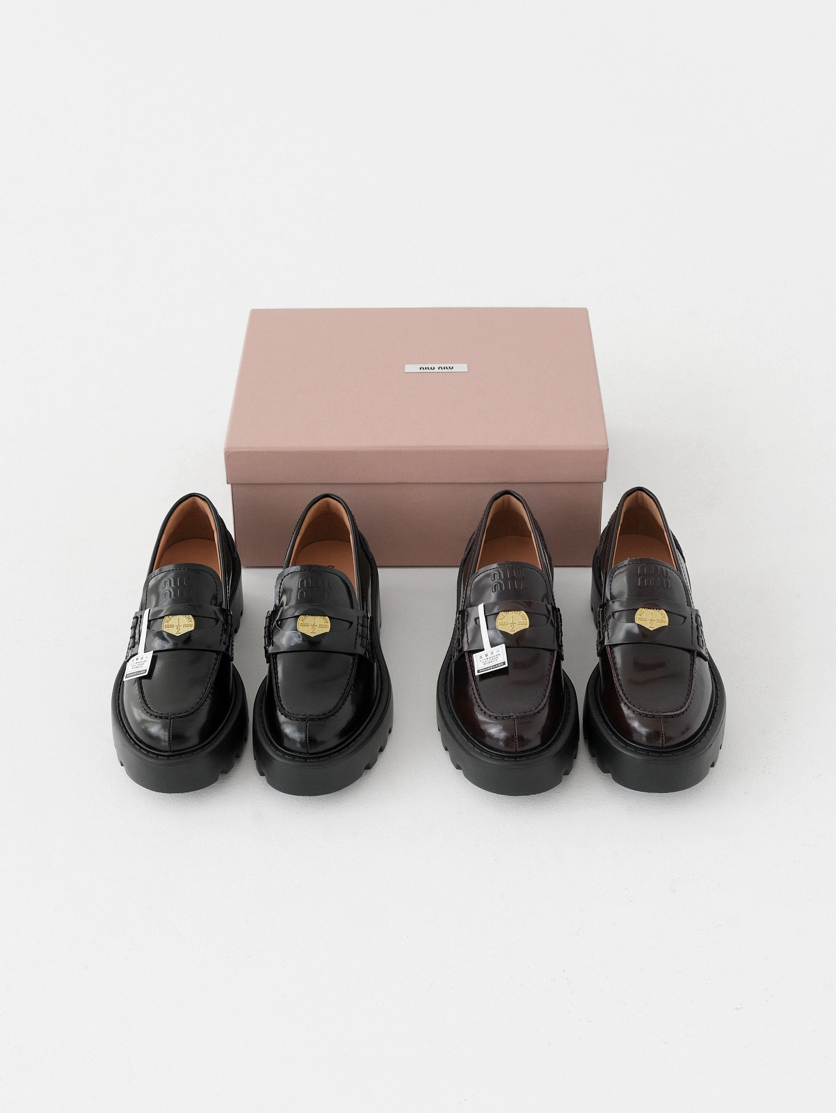 Miumiu thick-soled coin loafers