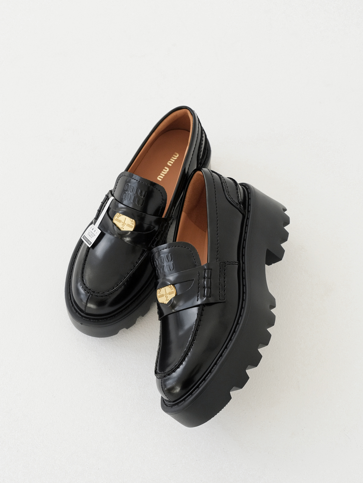Miumiu thick-soled coin loafers