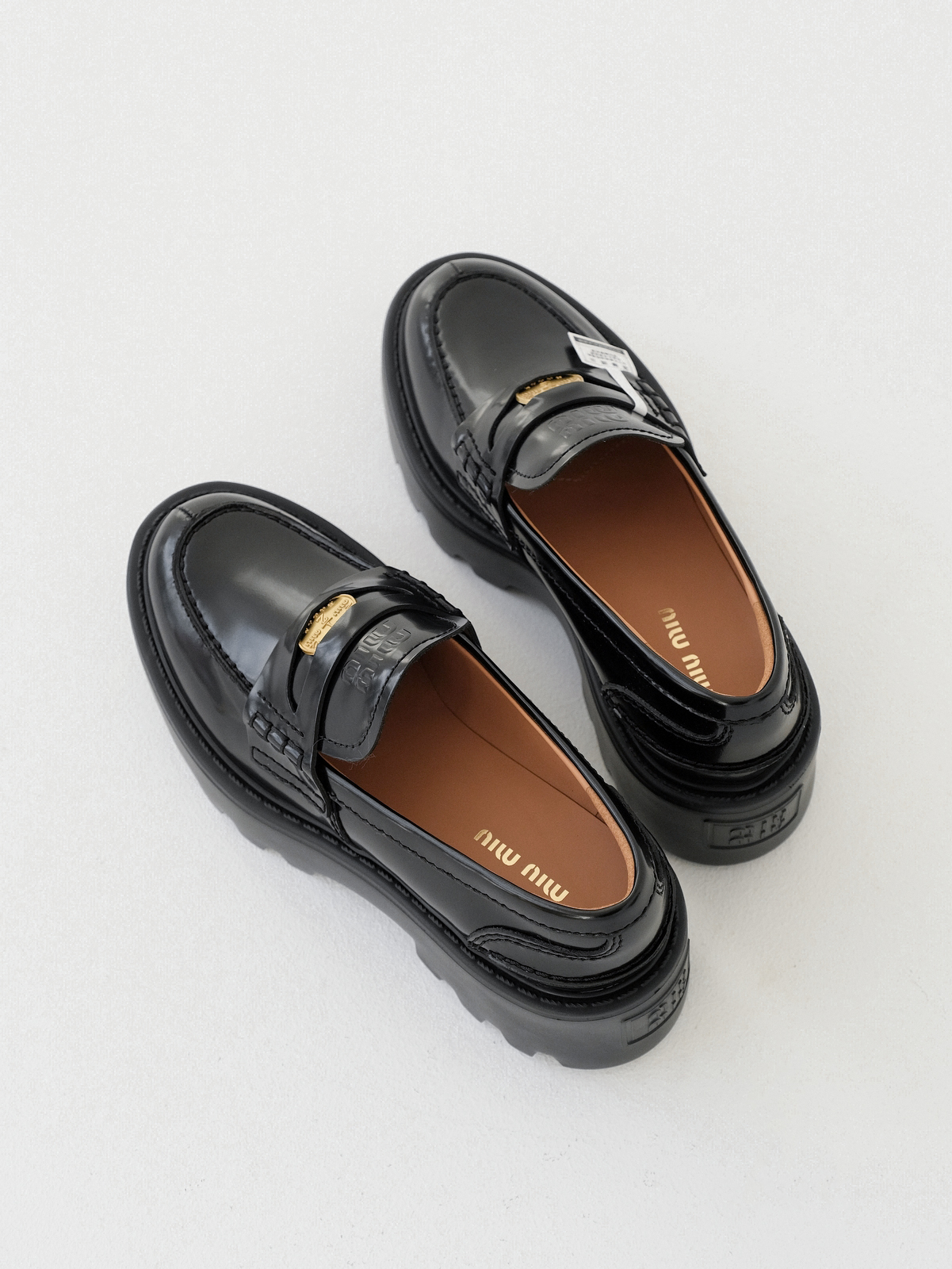 Miumiu thick-soled coin loafers