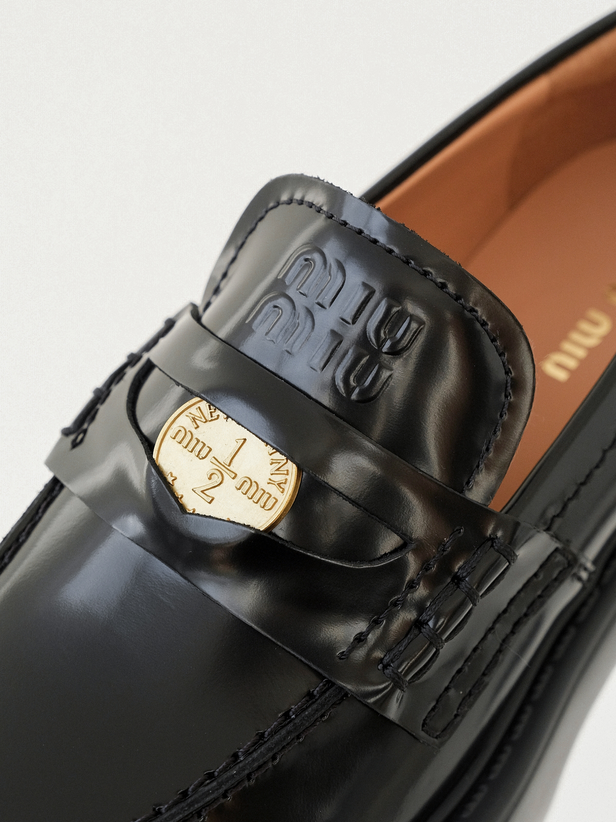 Miumiu thick-soled coin loafers