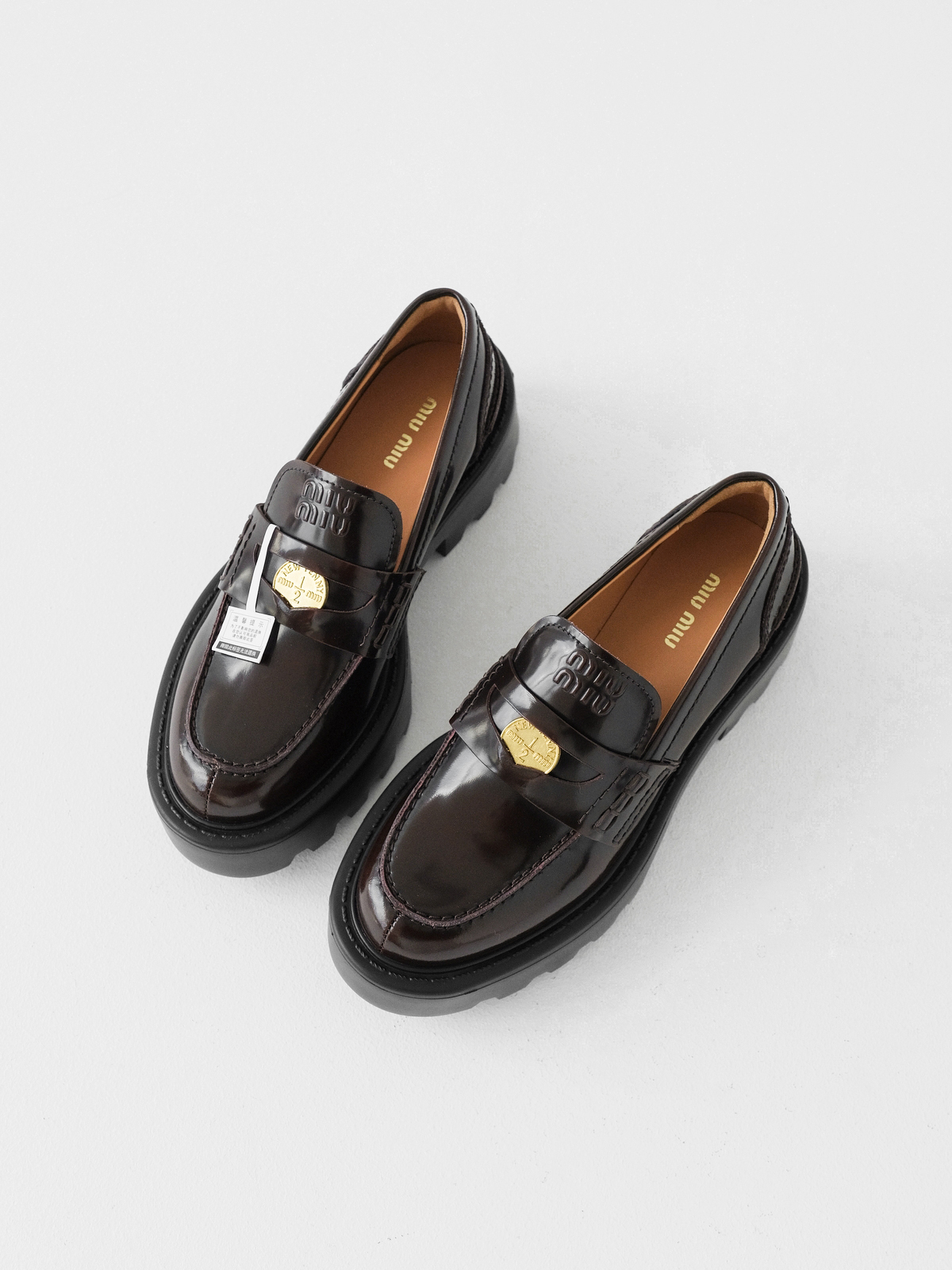 Miumiu thick-soled coin loafers